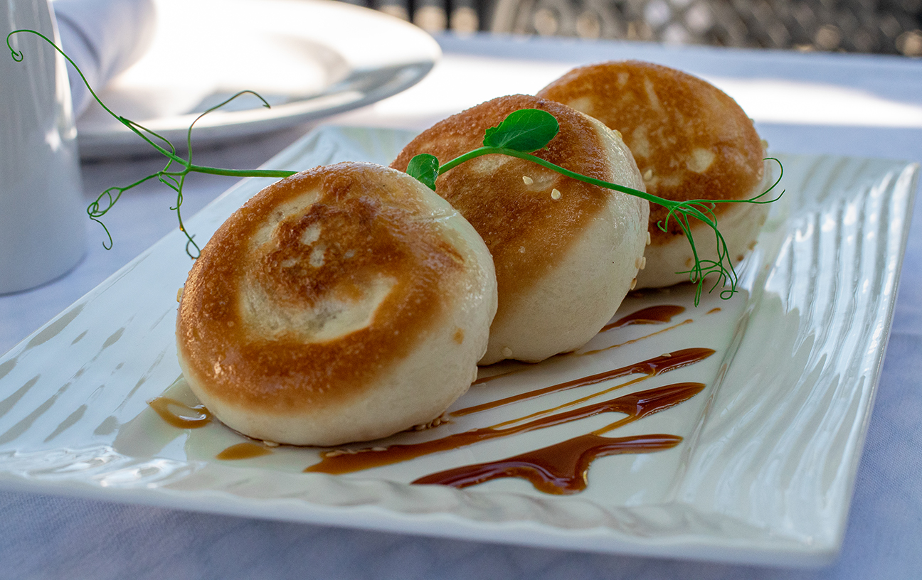 Order Pan-Fried Little Dragon Bao food online from Uncle Yu At The Vineyard store, Livermore on bringmethat.com