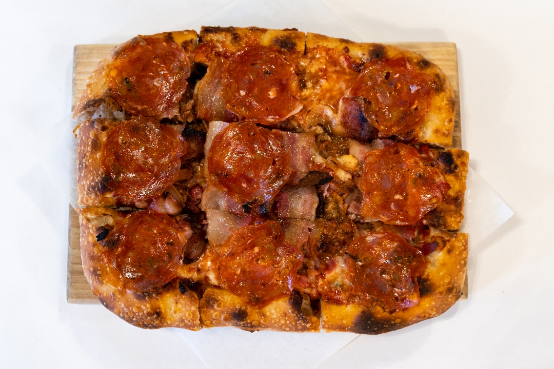 Order Pork reigns Family food online from Pizzeria Monzu store, Las Vegas on bringmethat.com