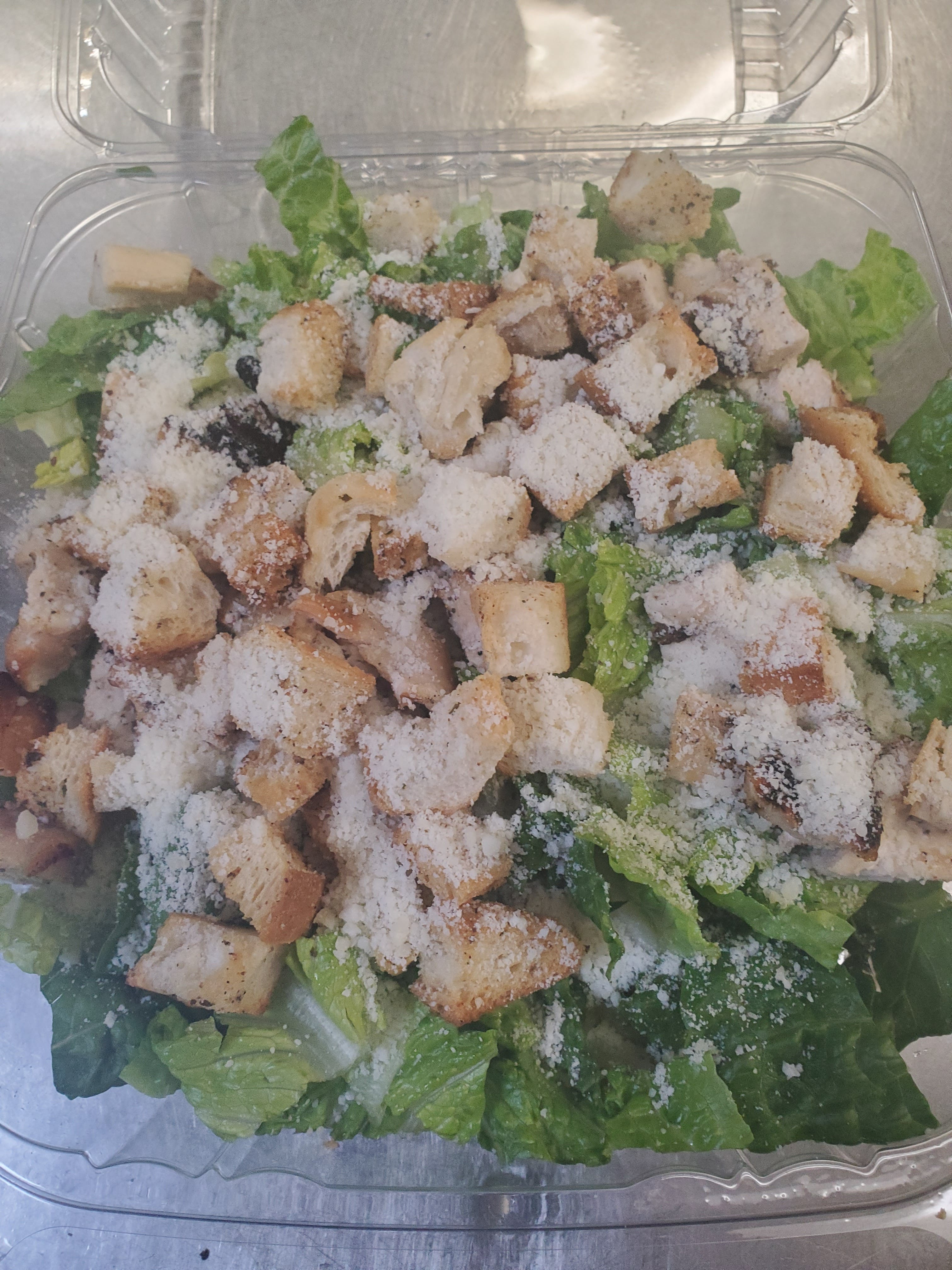 Order Grilled Chicken Caesar Salad - Salad food online from Pizza Cucina store, Oswego on bringmethat.com