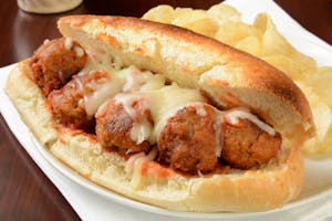 Order Meatball Sand w/Chips food online from Milano Cafe & Deli store, Burbank on bringmethat.com