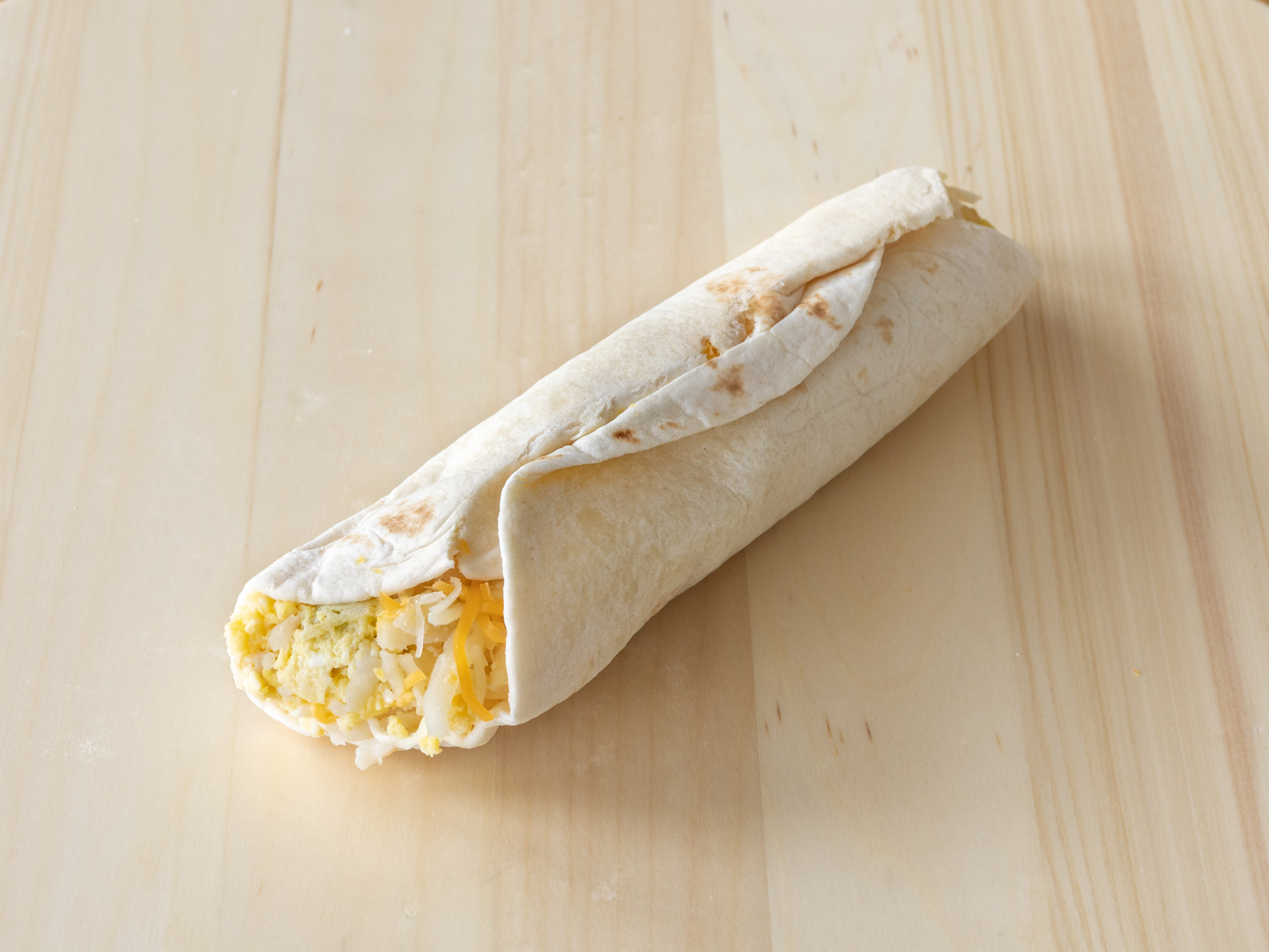 Order Potato Egg and Cheese Taco food online from Donut Hub store, Austin on bringmethat.com