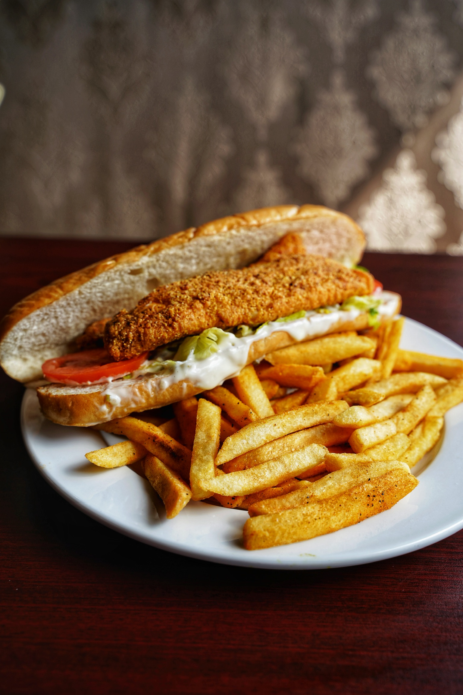 Order Fish Po-Boy Sandwich food online from Antika Cafe And Grill store, Houston on bringmethat.com