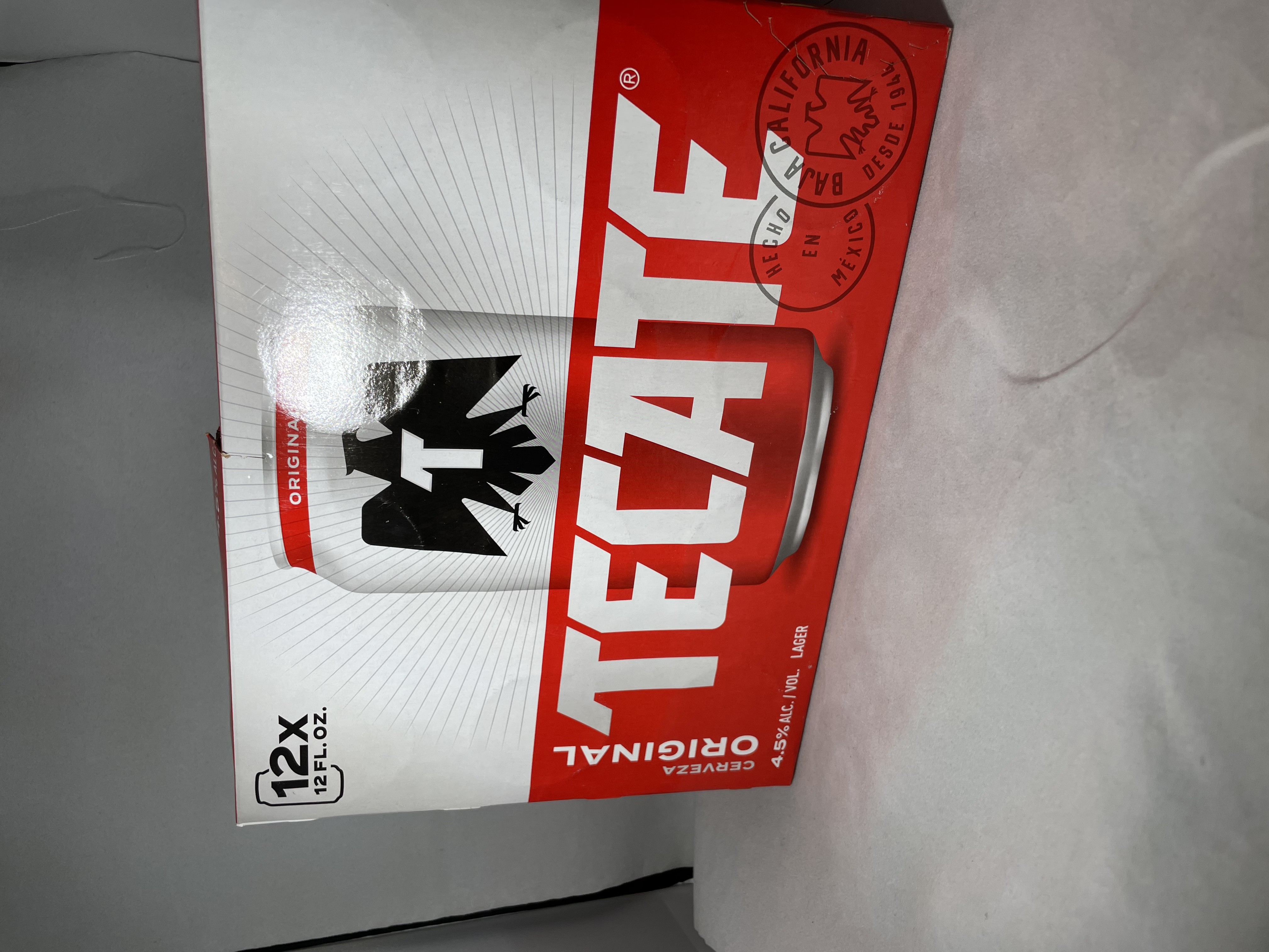 Order Tecate. 12 Pack 12oz cans food online from Tap & Bottle store, Tucson on bringmethat.com