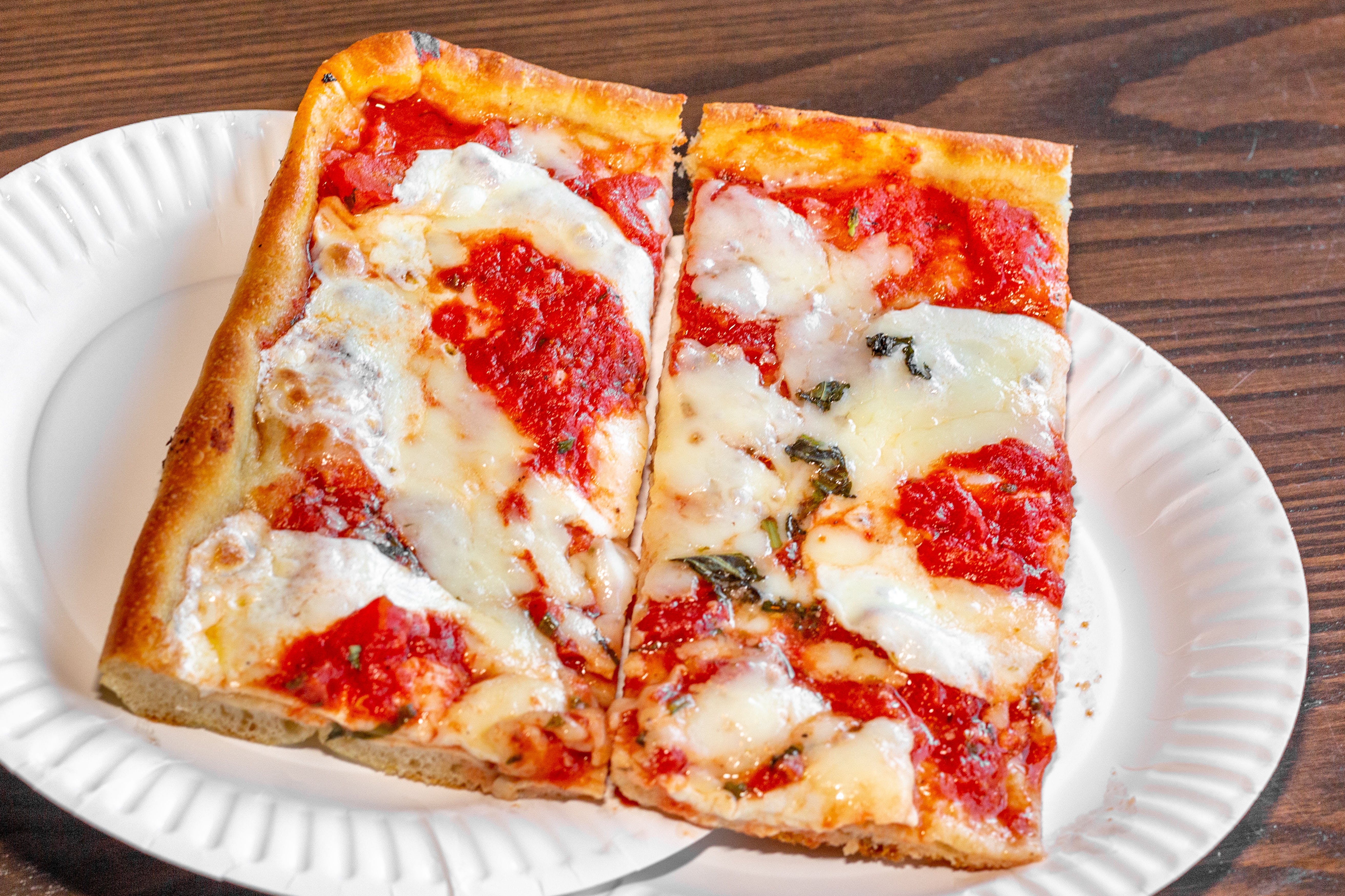 Order Sicilian Cheese Pizza Slice - Slice food online from King of Pizza store, Berlin on bringmethat.com