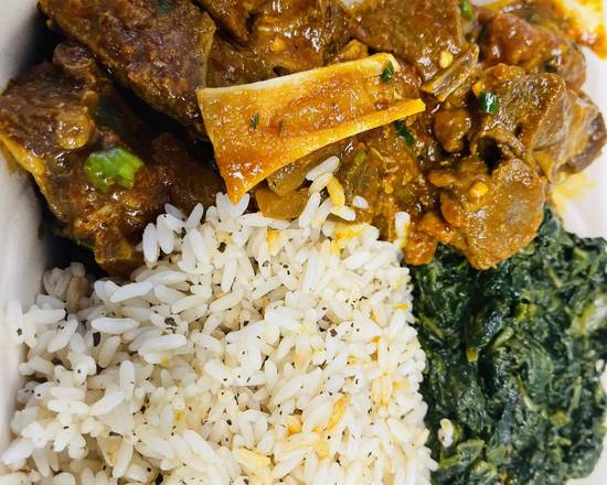 Order Goat curry with rice and greens food online from Kilimanjaro Grill store, Minneapolis on bringmethat.com