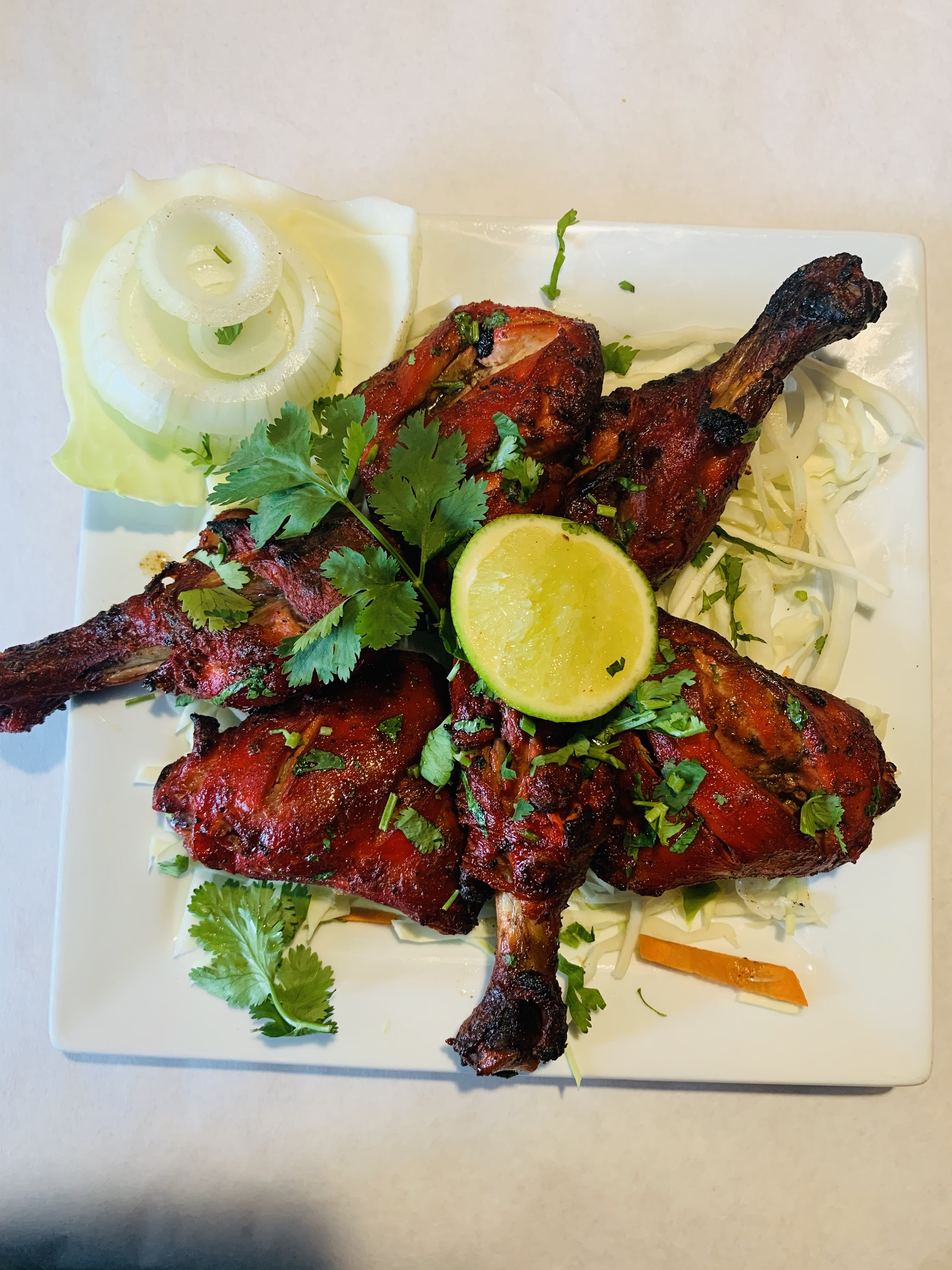Order Tandoori Chicken food online from Rajmahal Indian Restaurant store, Olathe on bringmethat.com