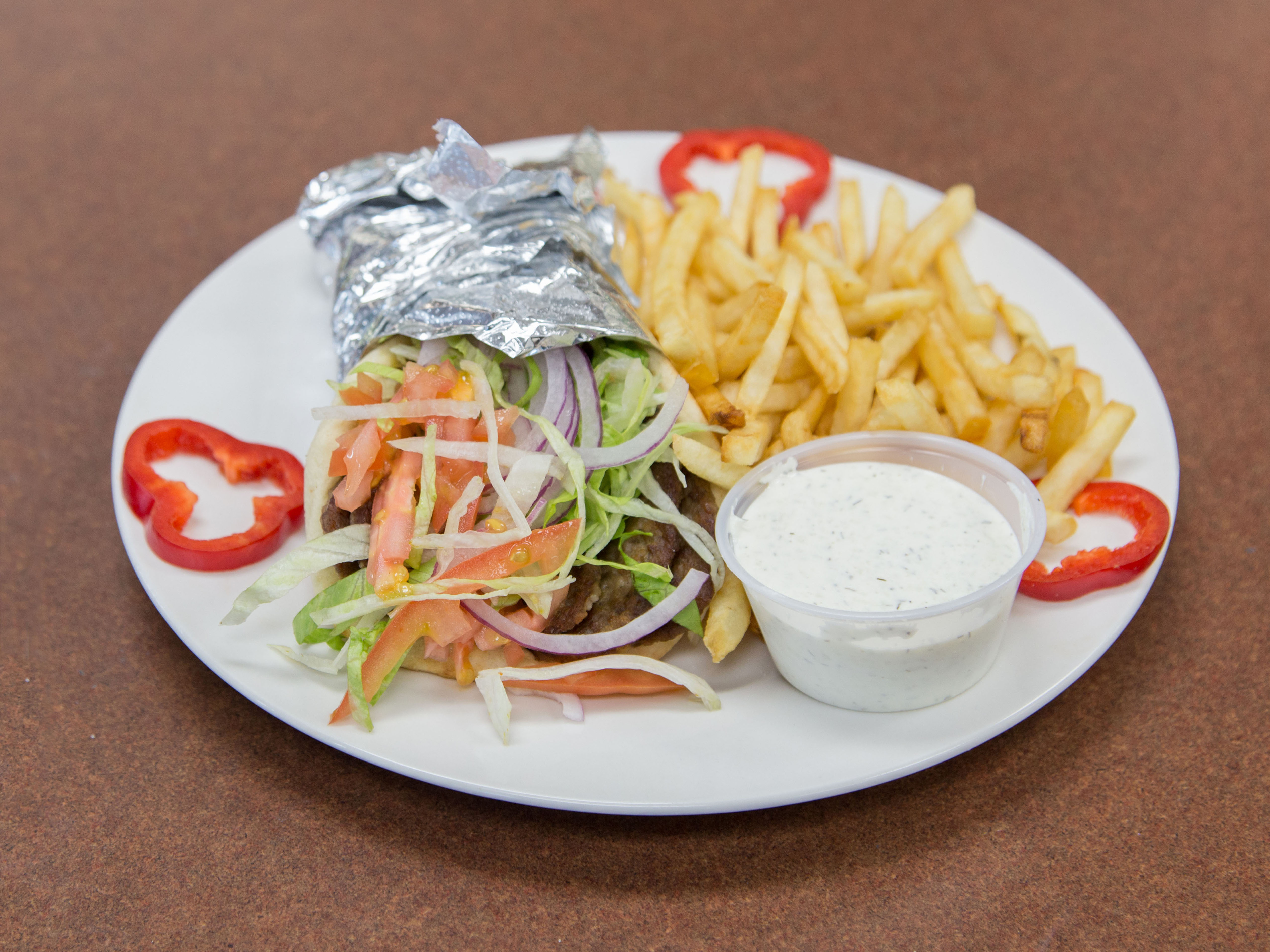 Order Beef Gyro food online from Harry's Hilltop Catering Delicatessen store, Williston Park on bringmethat.com