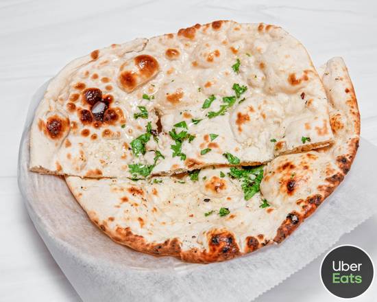 Order Garlic Naan food online from Lazzat store, Wantagh on bringmethat.com