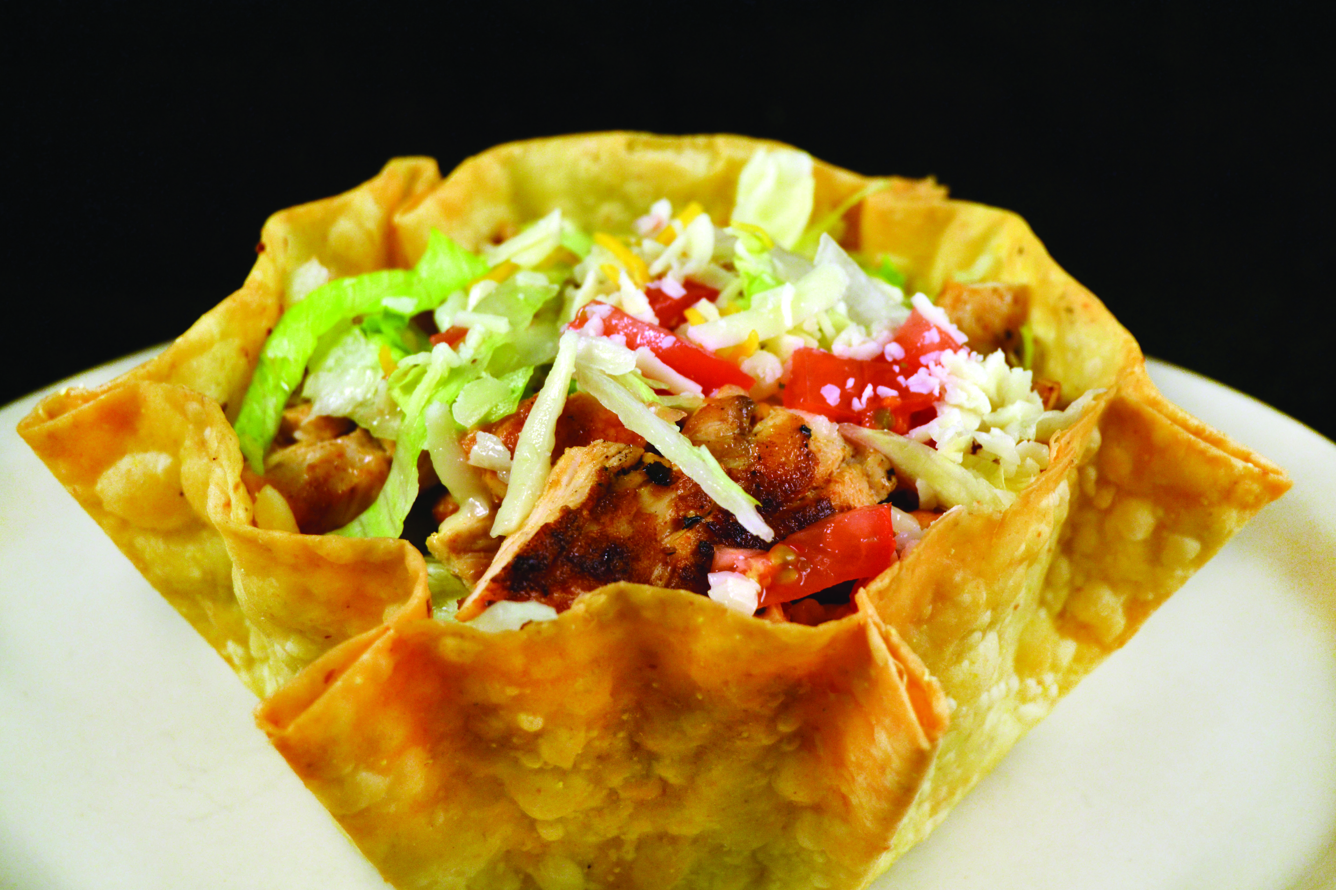 Order Taco Salad food online from Mi Comal Mexican Restaurant store, Irving on bringmethat.com