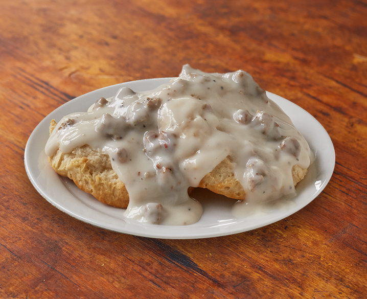 Order Biscuits (2) with Sausage Gravy food online from Huddle House store, Austin on bringmethat.com