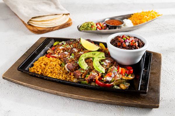 Order Black Bean & Veggie Fajitas (with Avocado) food online from Chili's Grill & Bar store, Forest City on bringmethat.com
