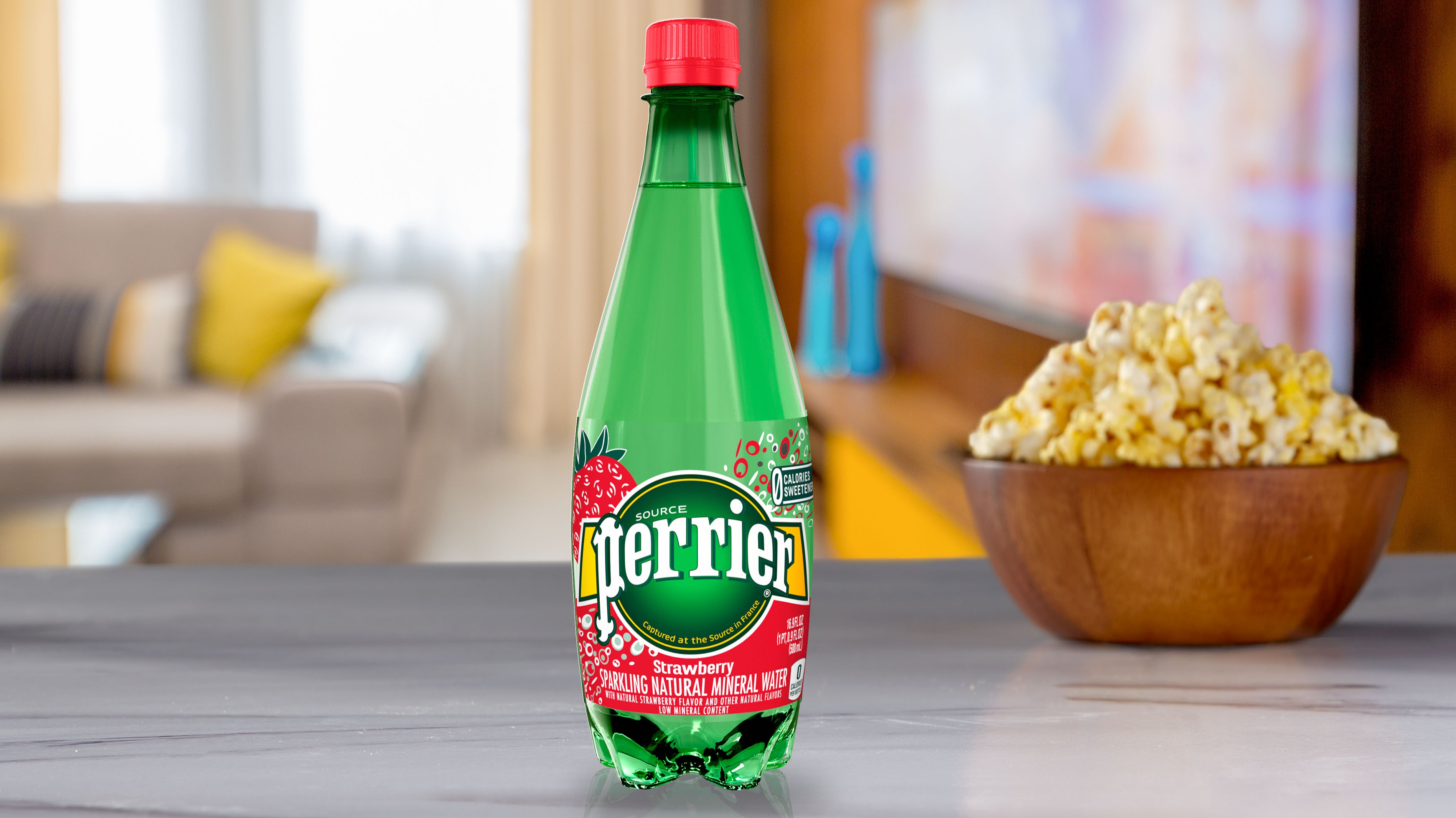 Order 16.9oz Perrier Strawberry Flavored Carbonated Mineral Water food online from Harkins Theatres Moreno Valley 16 store, Moreno Valley on bringmethat.com