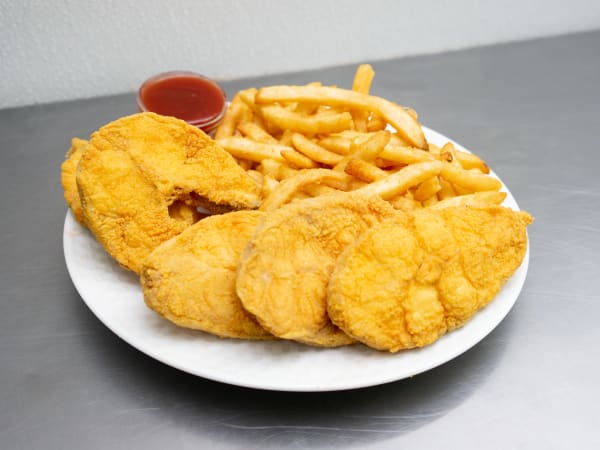 Order 4 Piece Catfish food online from Sharks Fish & Chicken store, Gary on bringmethat.com
