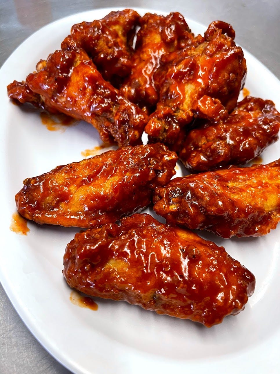Order Sonny's Wings - 8 Pieces food online from Sonny Restaurant & Pizzeria store, Englewood on bringmethat.com