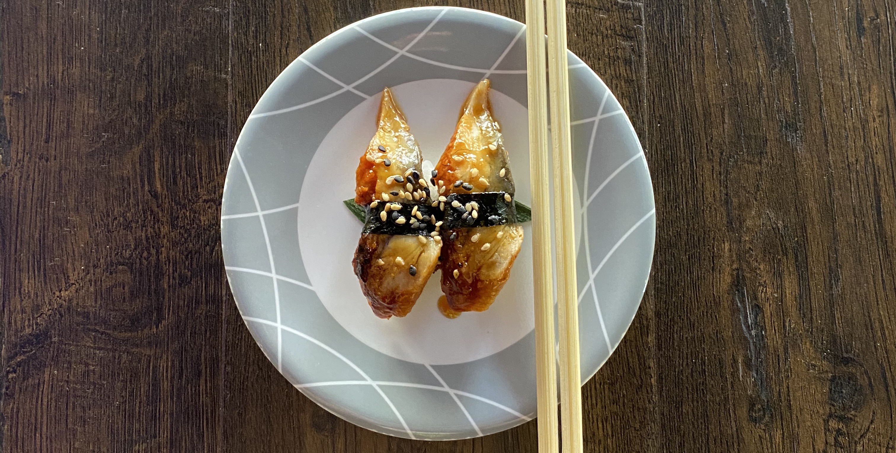 Order Eel Nigiri - 2 Pieces food online from Sushi Train store, Minneapolis on bringmethat.com