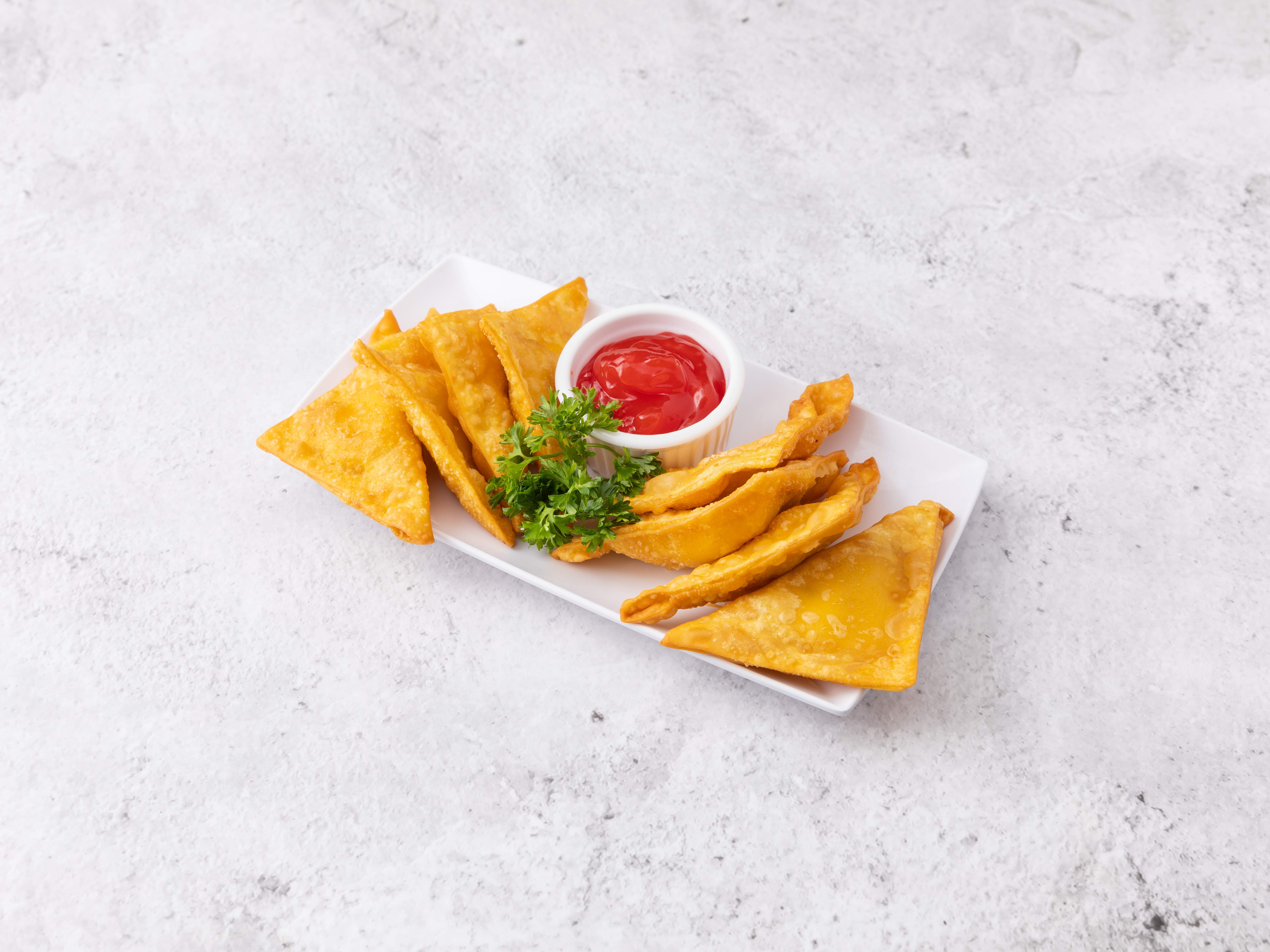 Order 5. Crab Rangoon 蟹角 food online from Ginza Japanese Resturant store, Runnemede on bringmethat.com