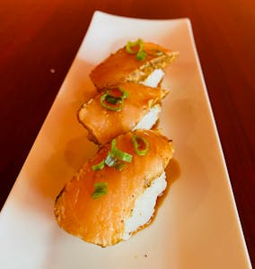 Order Cajun Salmon Nigiri (6 Pieces) food online from Asian Pot Express store, Lewisville on bringmethat.com