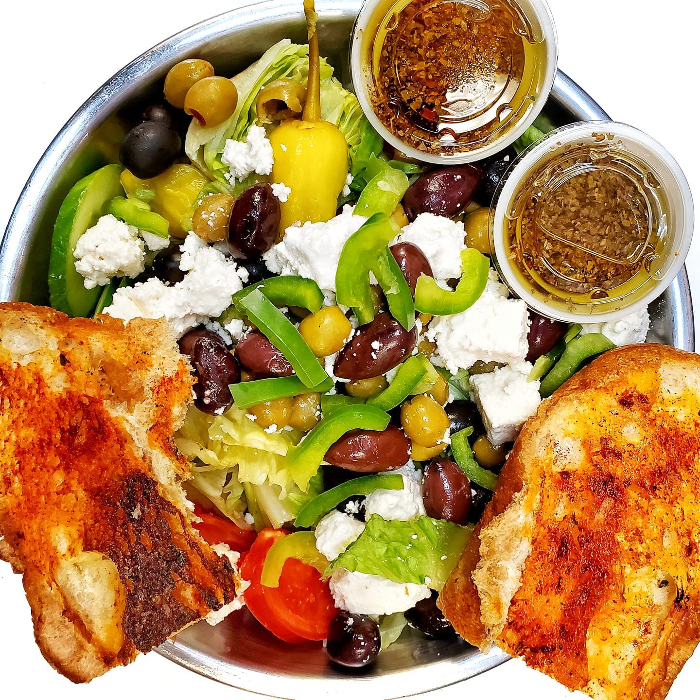 Order Greek Salad - Salad food online from Napoli Pizza store, Henderson on bringmethat.com