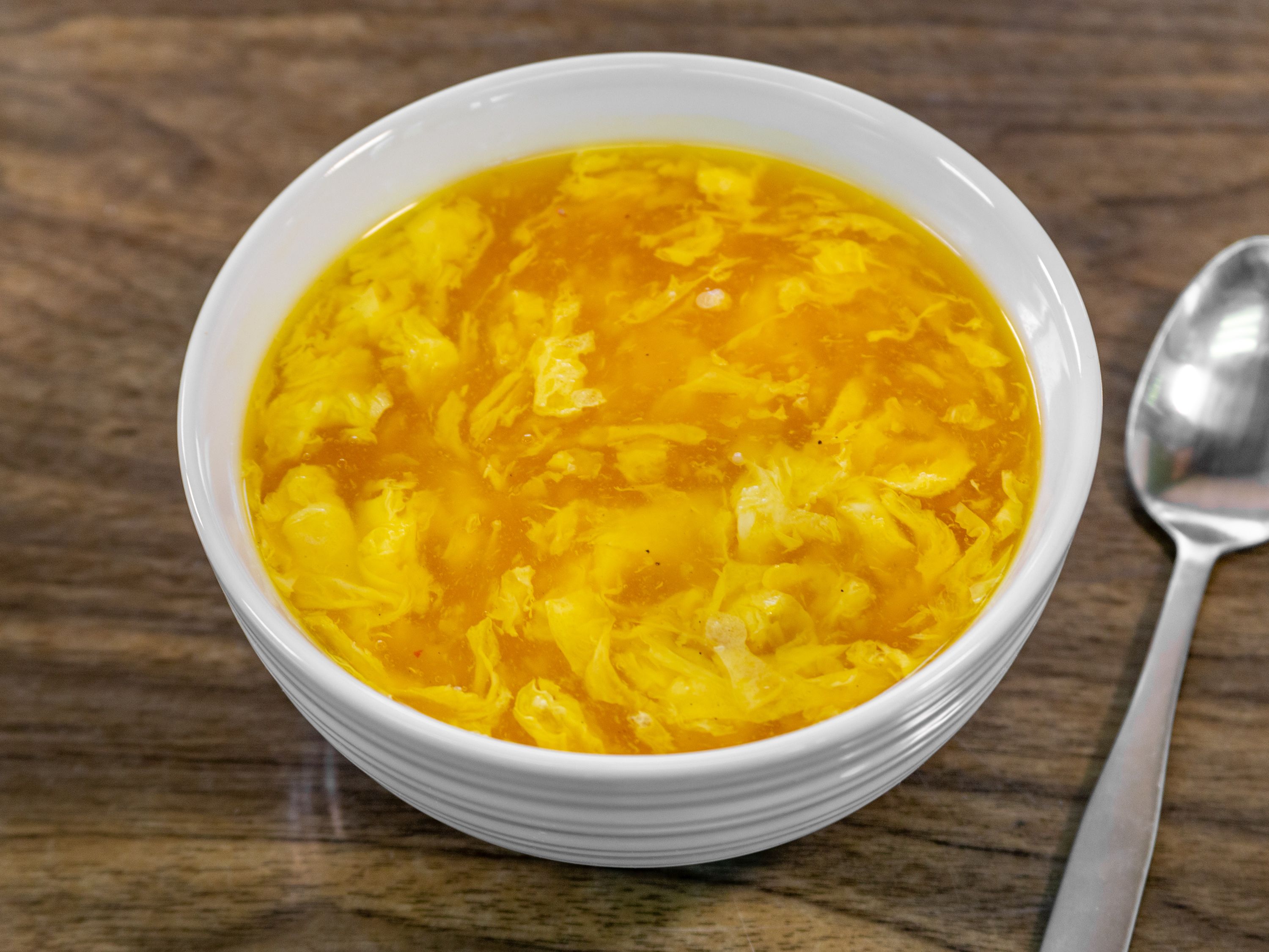 Order 16. Egg Drop Soup food online from Jing Jing Asian Restaurant store, Newport News on bringmethat.com
