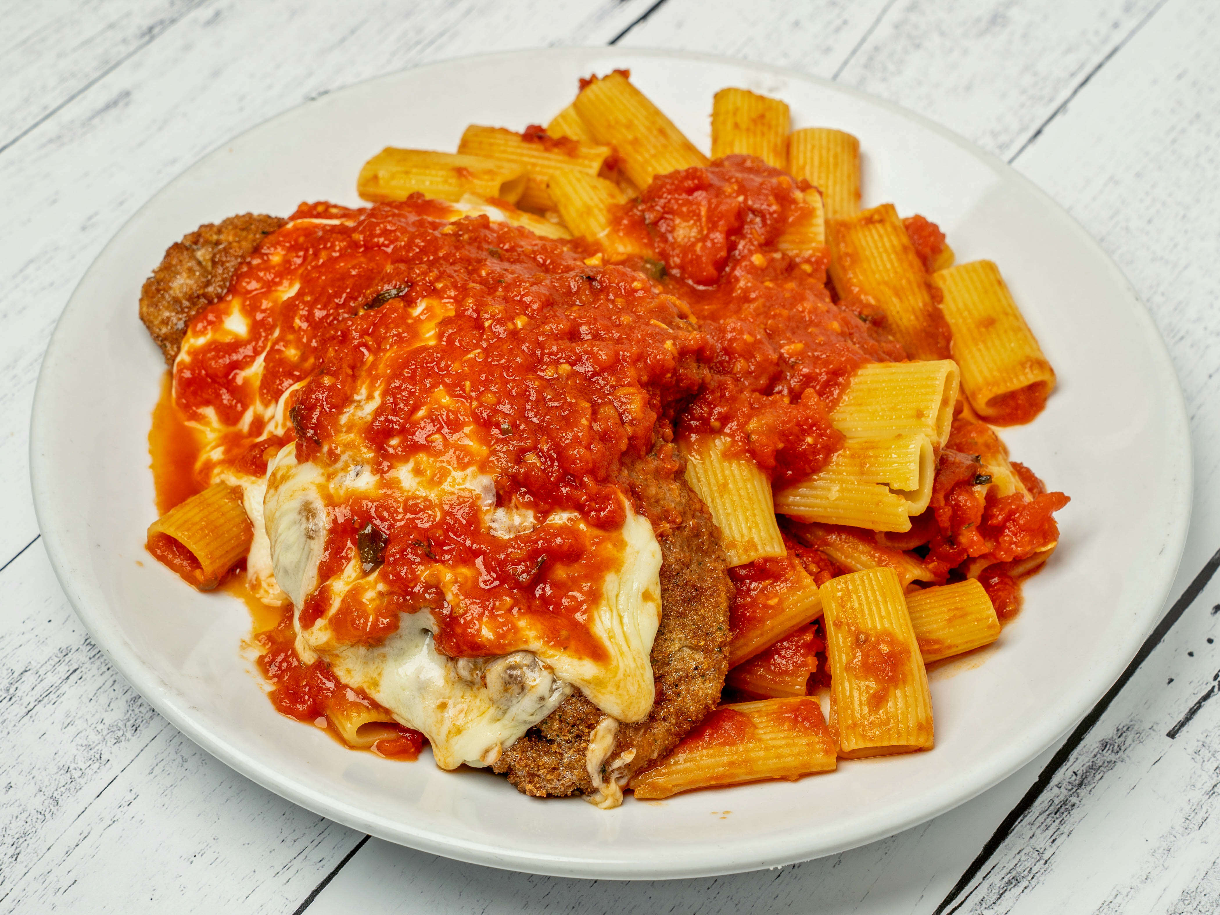 Order Veal Parmigiana food online from Salvatore's Restaurant store, Lawrence on bringmethat.com