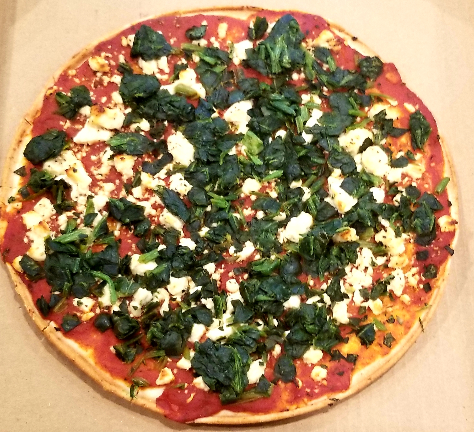 Order Gola spinach pizza and feta cheese  food online from Gola Market Food & Coffee store, Silver Spring on bringmethat.com