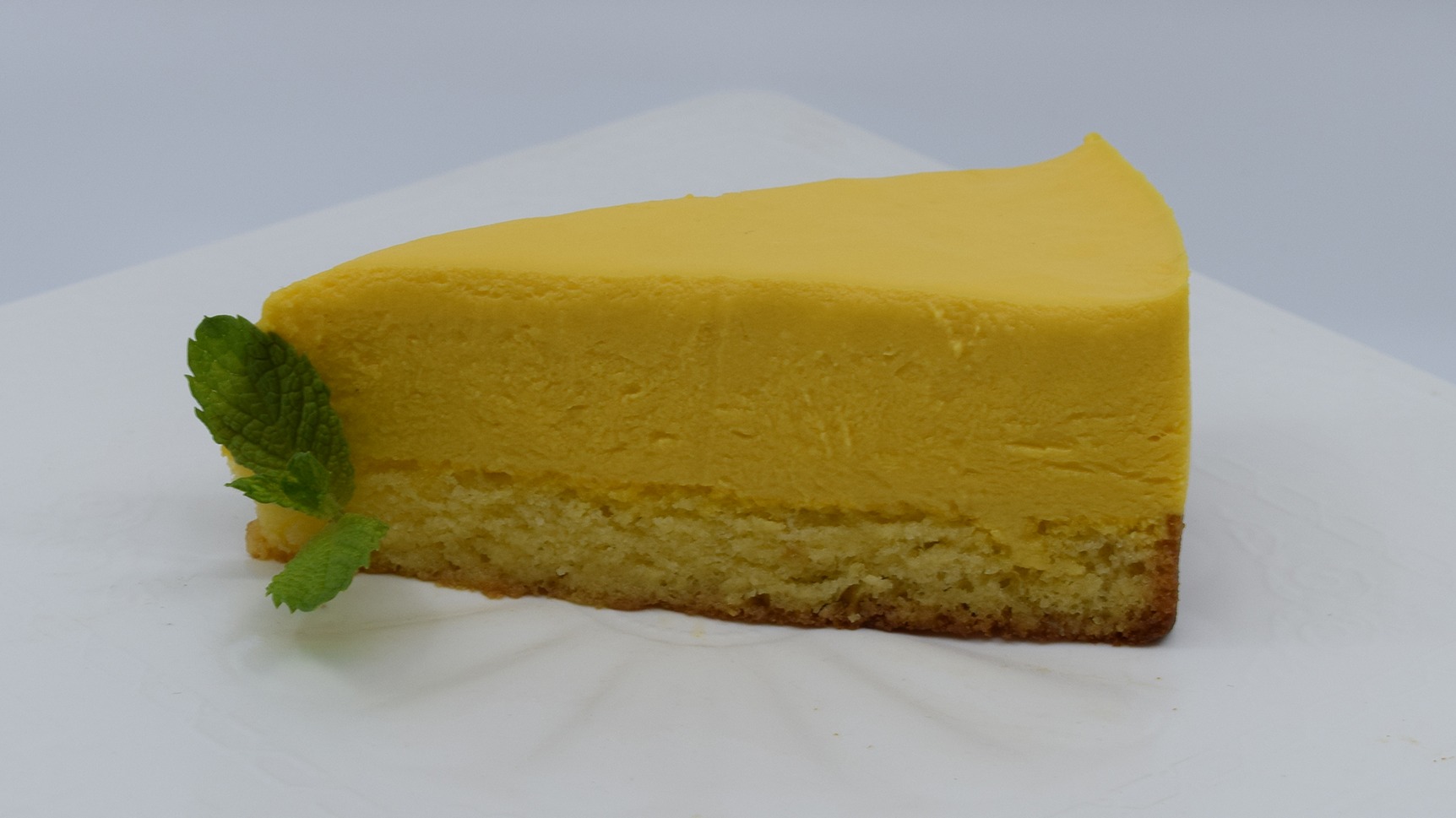 Order Cake Mango Mousse food online from Burger Fanatics store, San Diego on bringmethat.com