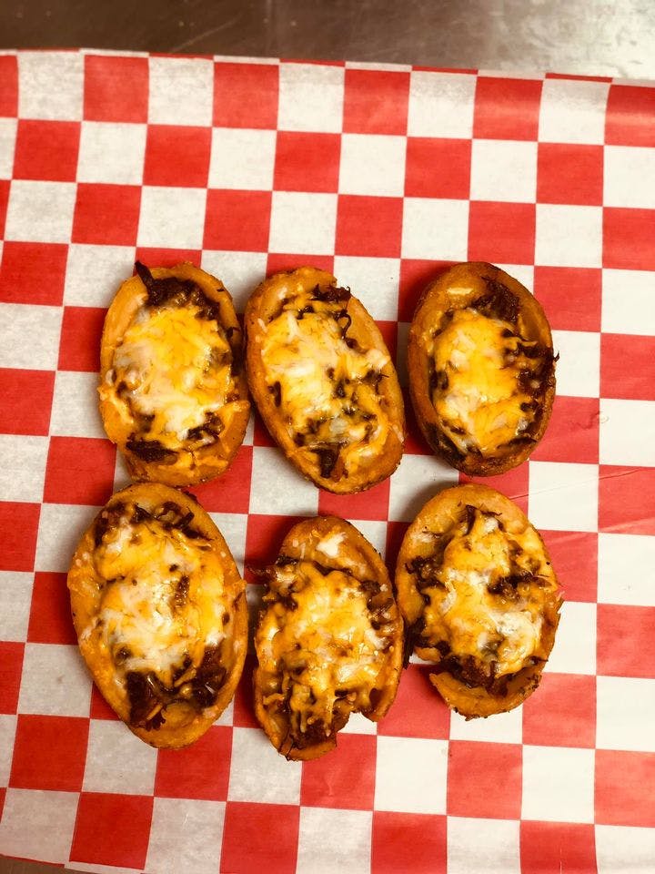 Order Potato Skins - 6 Pieces food online from Brother Joe Bbq store, Waveland on bringmethat.com
