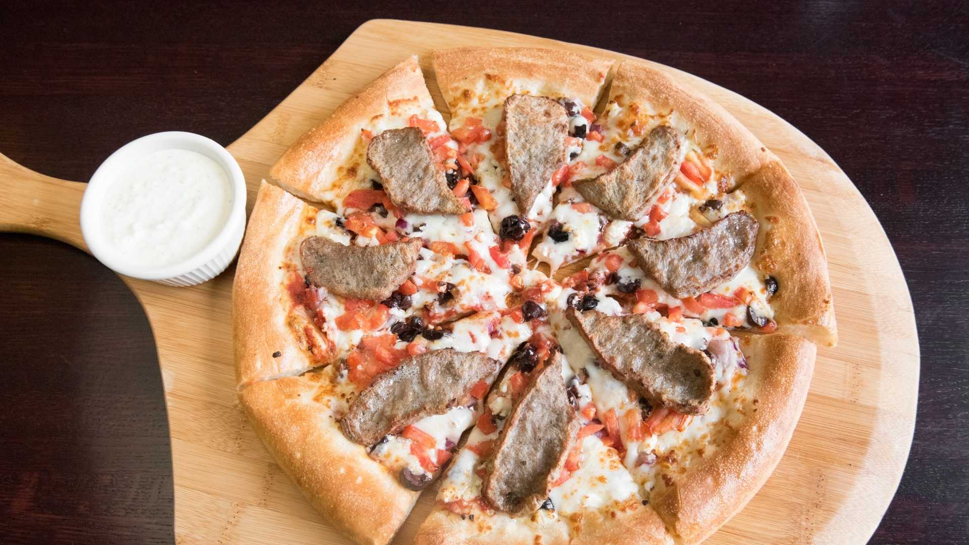 Order Greek Special Pizza food online from Soprano's Pizza & Pasta store, Seattle on bringmethat.com