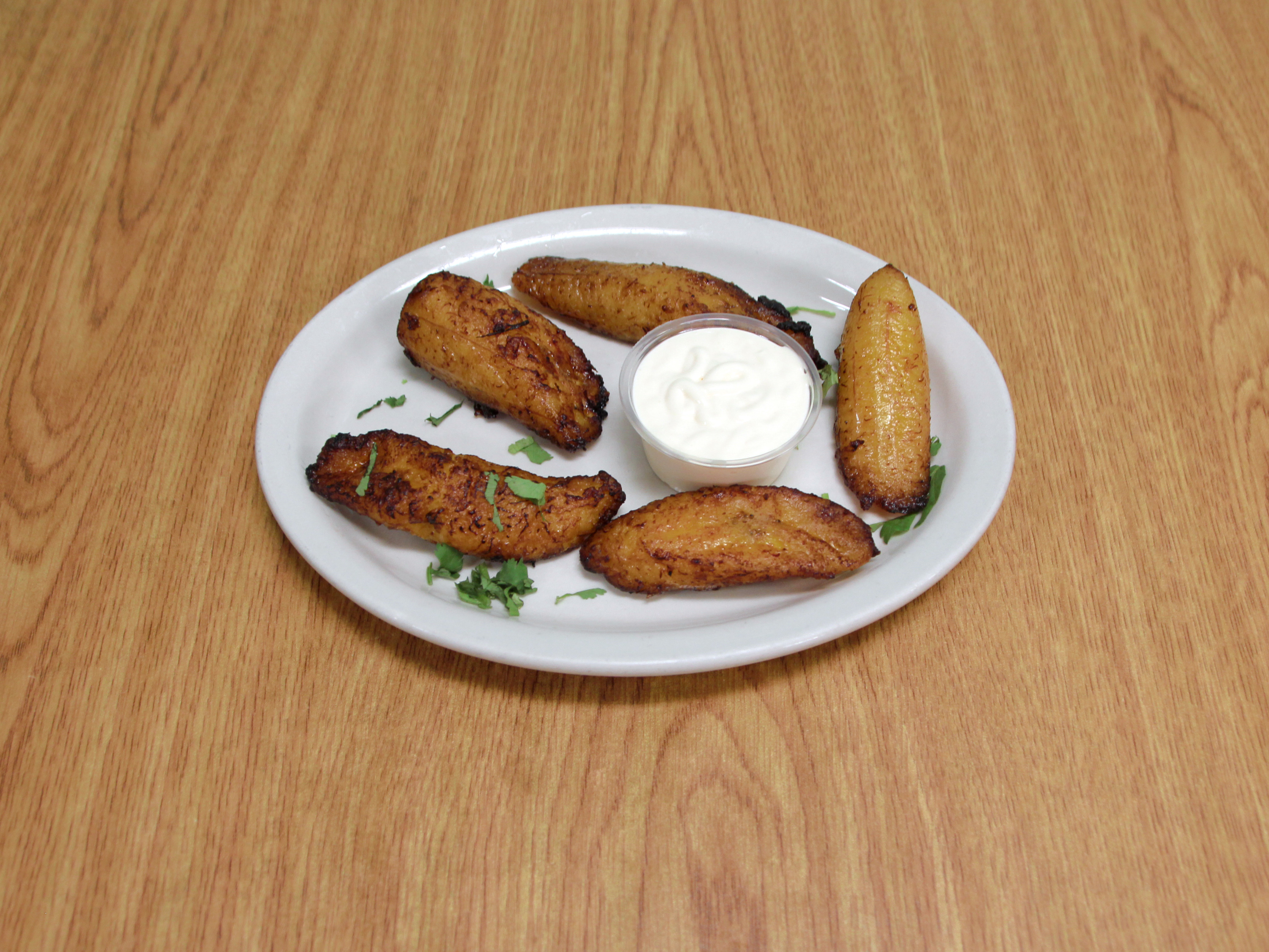Order Side of Maduros food online from Santiago Mexican Restaurant store, Hilliard on bringmethat.com