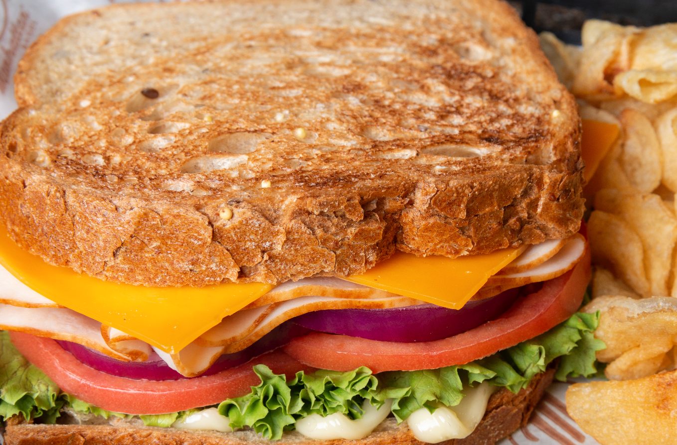 Order Turkey & Cheddar Sandwich food online from Manhattan Bagel store, Bayville on bringmethat.com