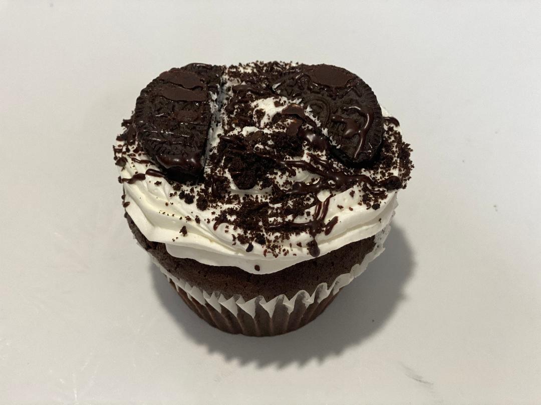 Order Oreo's and Cream Colossal Cupcake food online from E & L Bakery store, Bronx on bringmethat.com