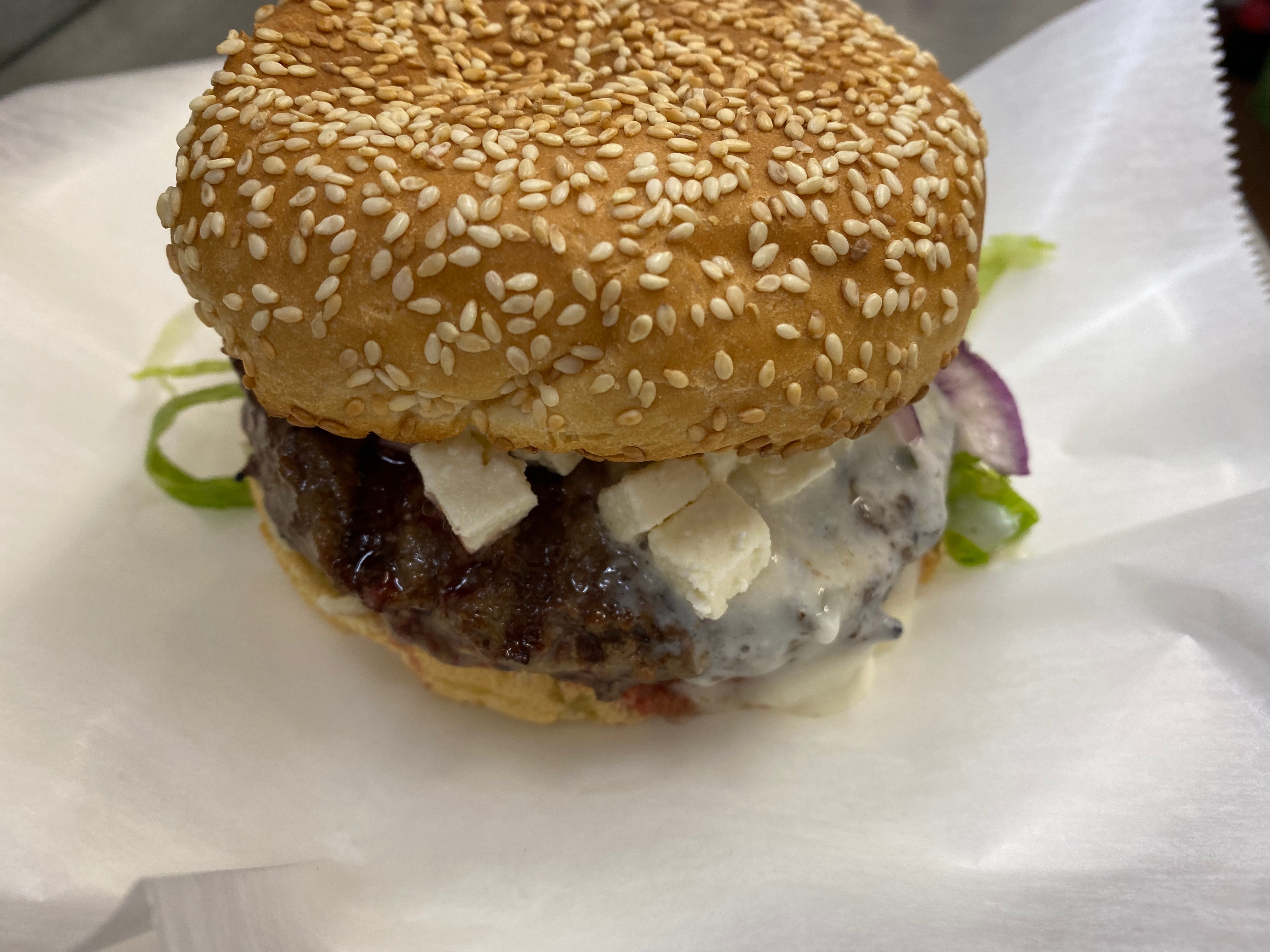 Order Greek Burger  food online from Famous Pizza store, Paramus on bringmethat.com