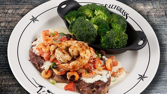 Order Cajun Ribeye food online from Saltgrass Steak House store, Arlington on bringmethat.com