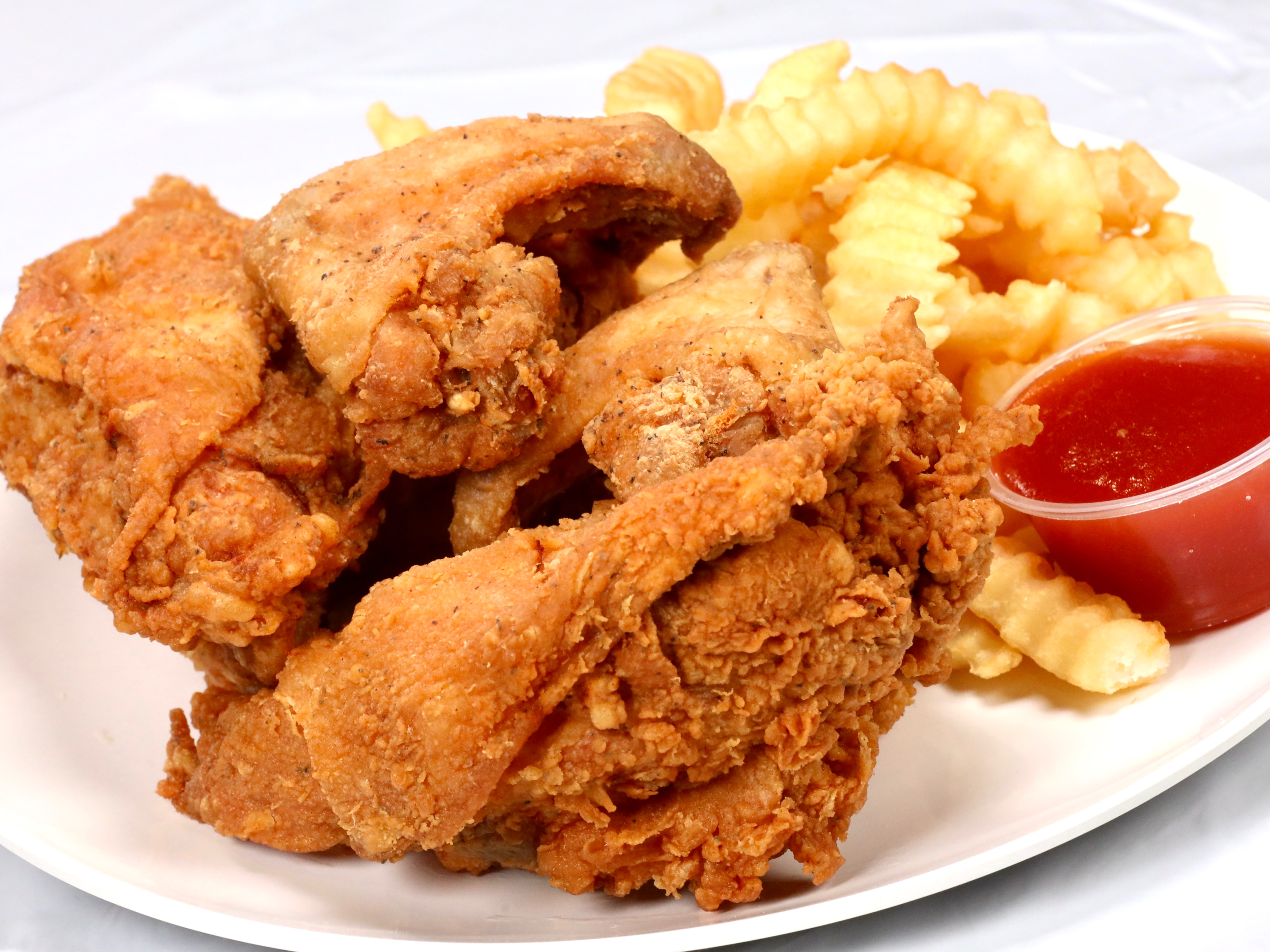 Order 1/2 Mix (1 Breast,1Wing,1Thigh,1Leg Fries & Bread food online from Sam Sylk Chicken And Fish store, Cleveland on bringmethat.com