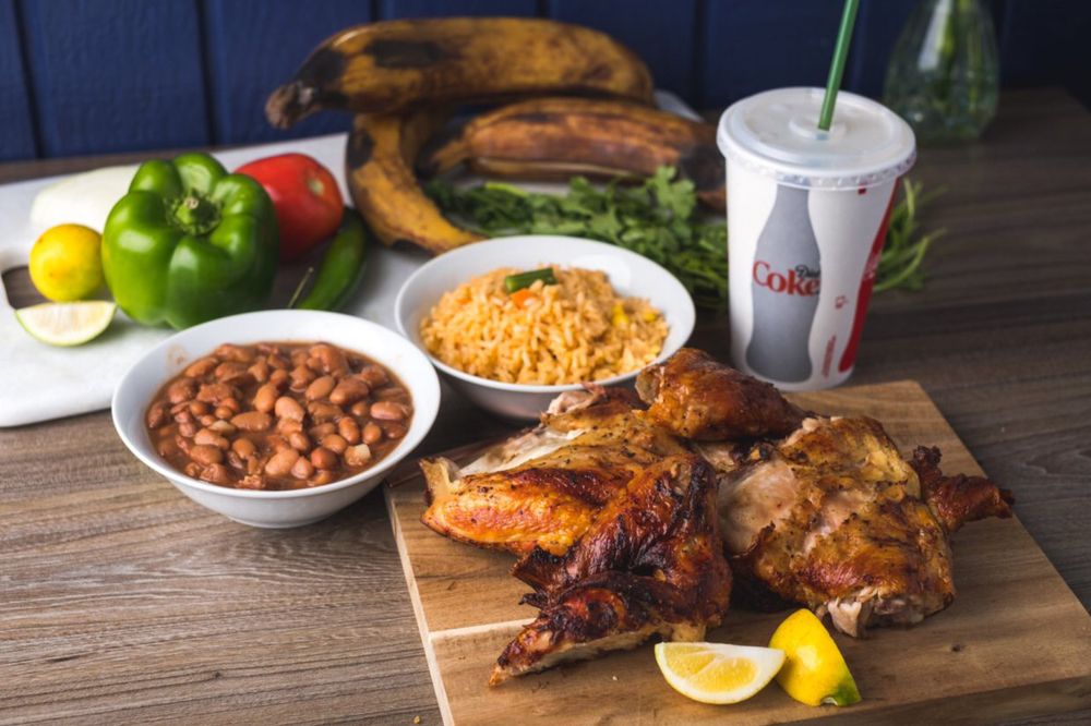 Order 4 Pieces Chicken, Rice, Beans and Soda Combo food online from El Pollo Supremo store, San Francisco on bringmethat.com
