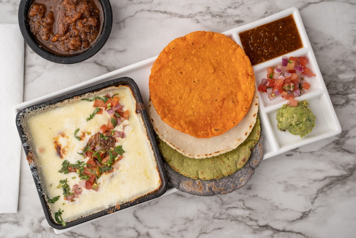 Order Queso Fundido 9.99 food online from Zocalo Street Food | Tequila store, Wilmington on bringmethat.com