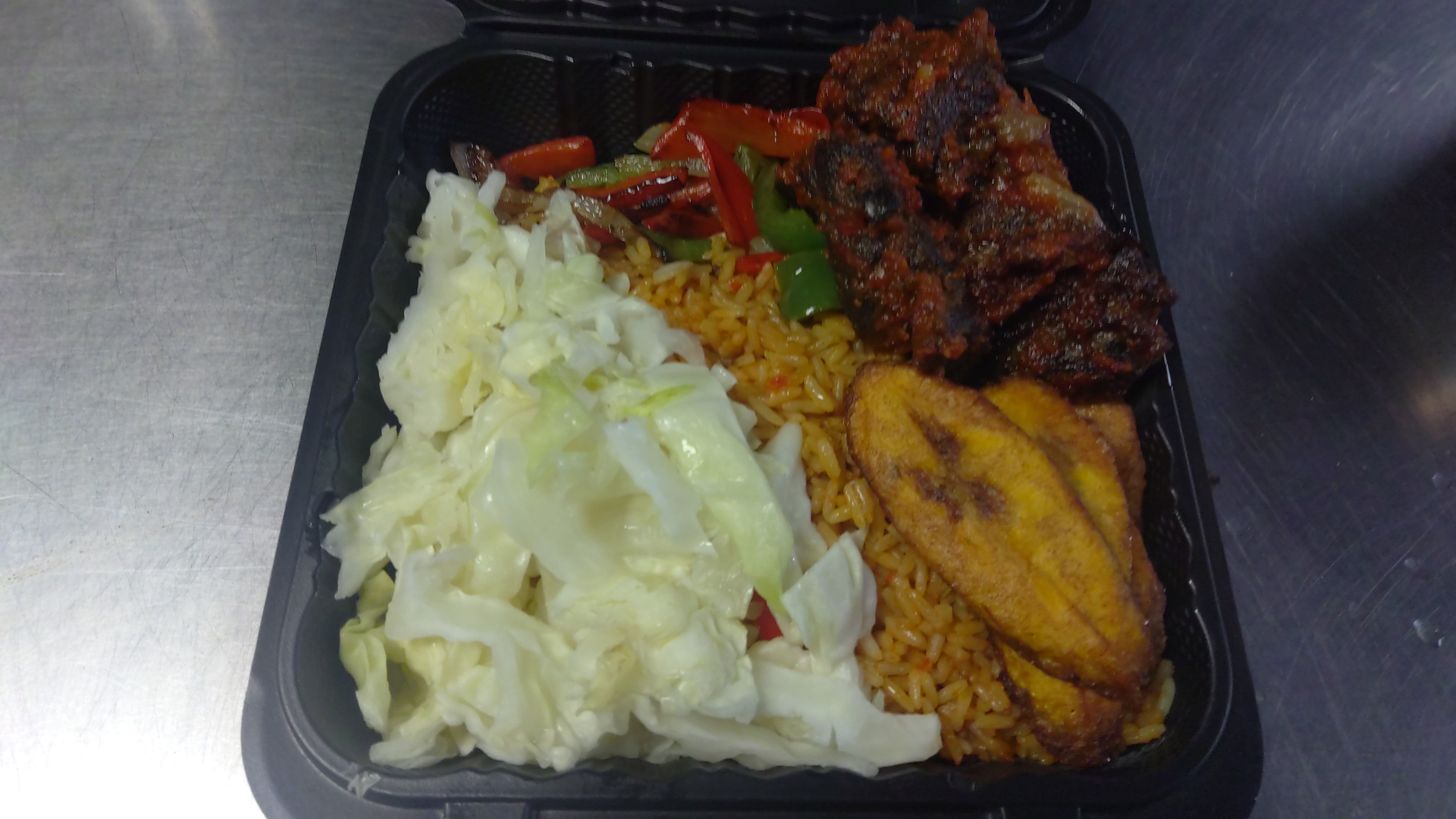 Order 2d. Rice with Peppered Beef food online from Africana Cuisine store, Perry Hall on bringmethat.com