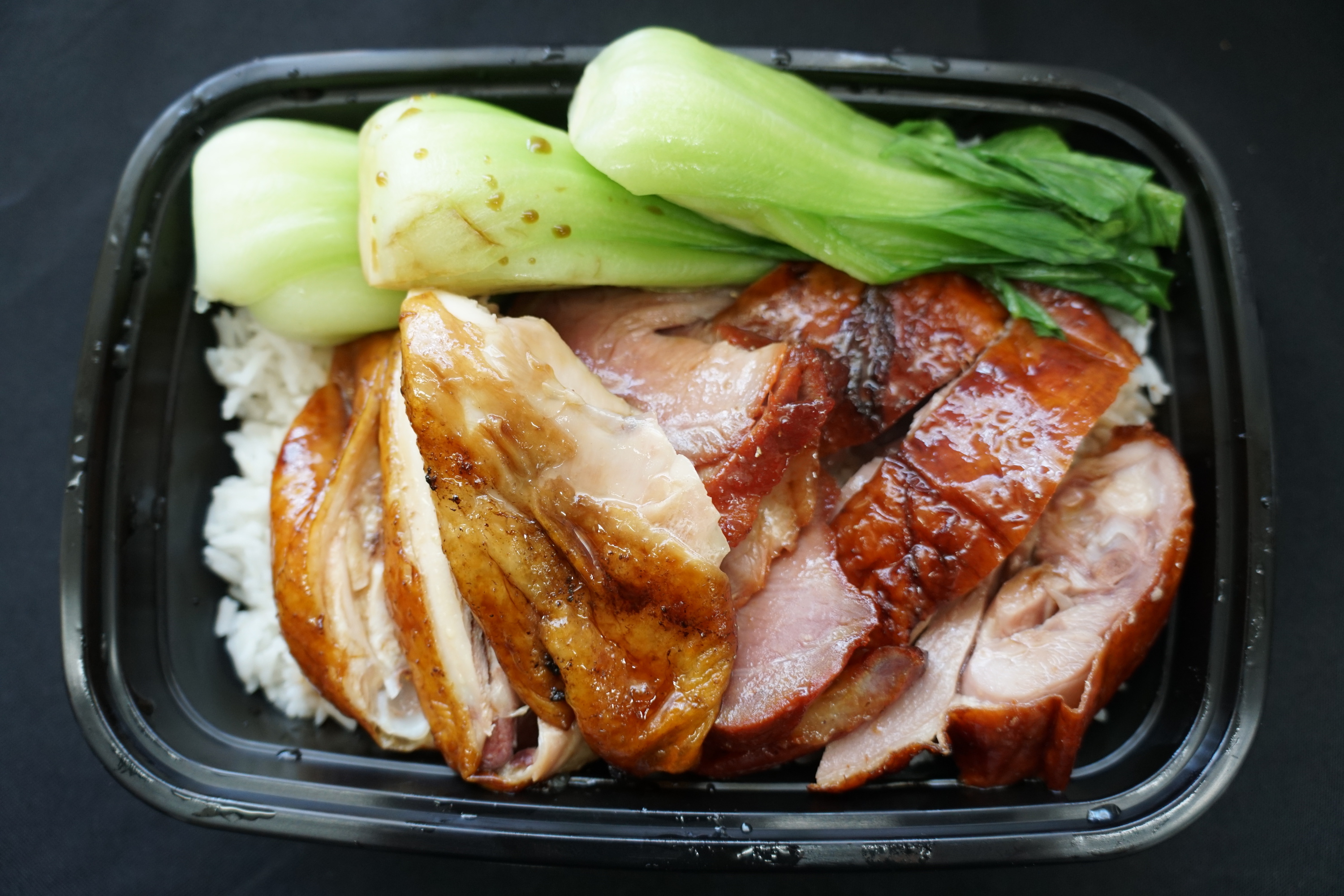 Order BBQ Combo on Rice food online from Keefer Court Cafe & Bakery store, Minneapolis on bringmethat.com