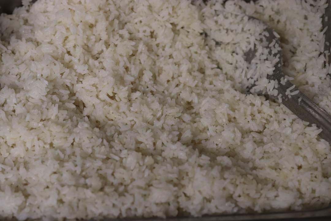 Order Arroz Blanco - White Rice pequeno food online from Don Quijote Restaurant store, Manchester on bringmethat.com