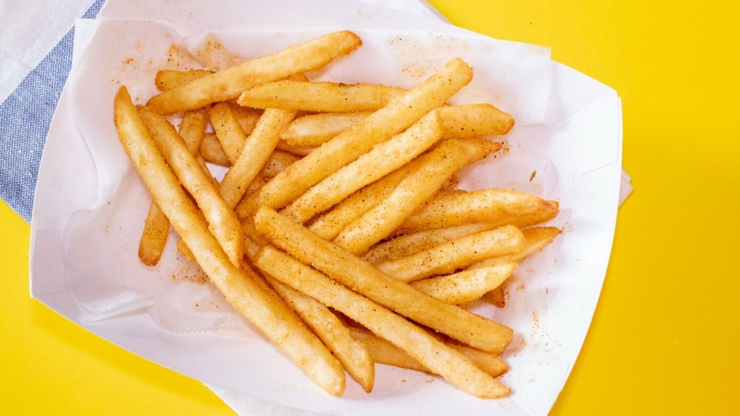 Order French Fries food online from The Station Seafood Co. store, Houston on bringmethat.com