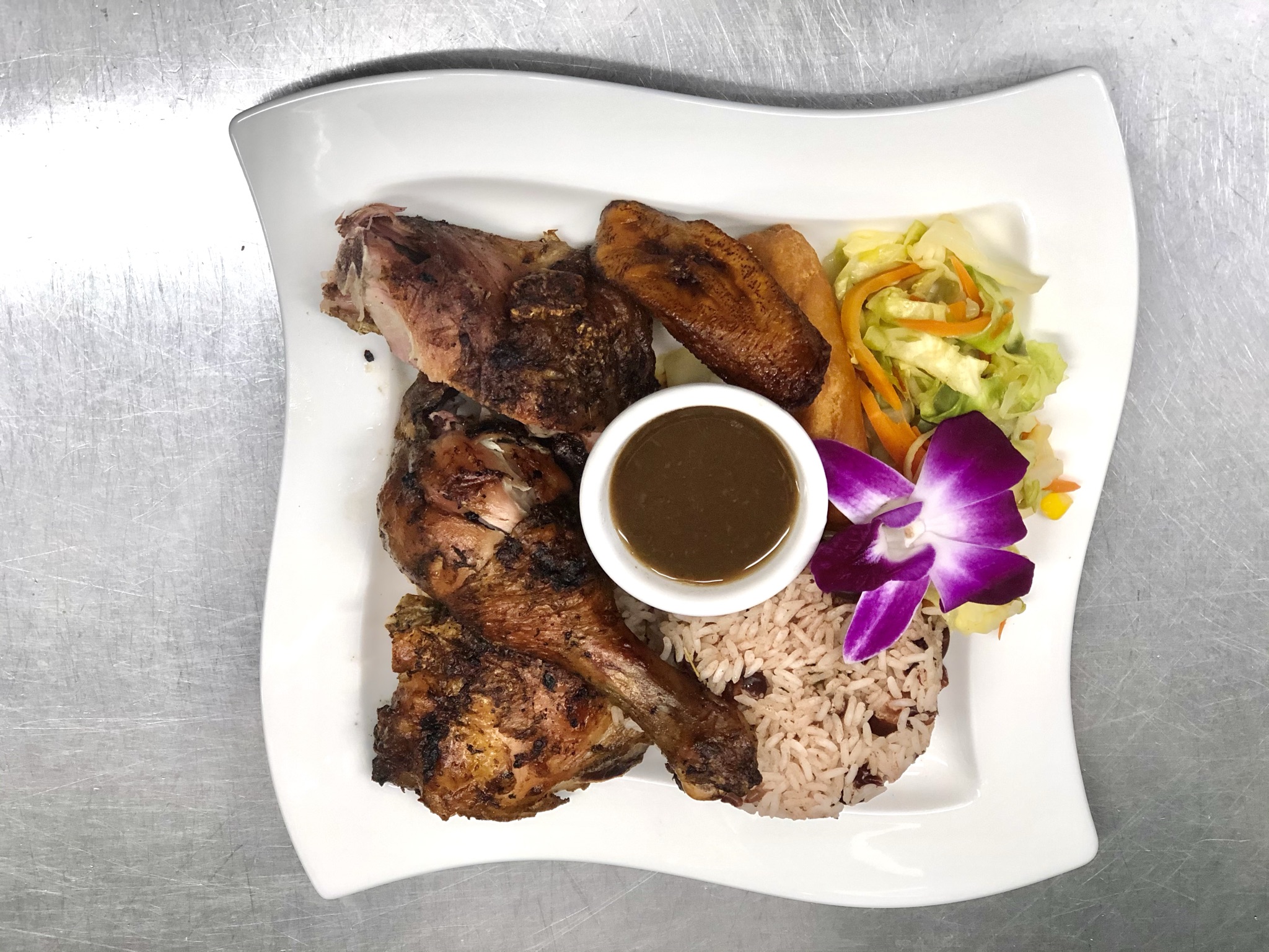 Order Jerk Chicken food online from One876 Caribbean Restaurant store, Chatsworth on bringmethat.com