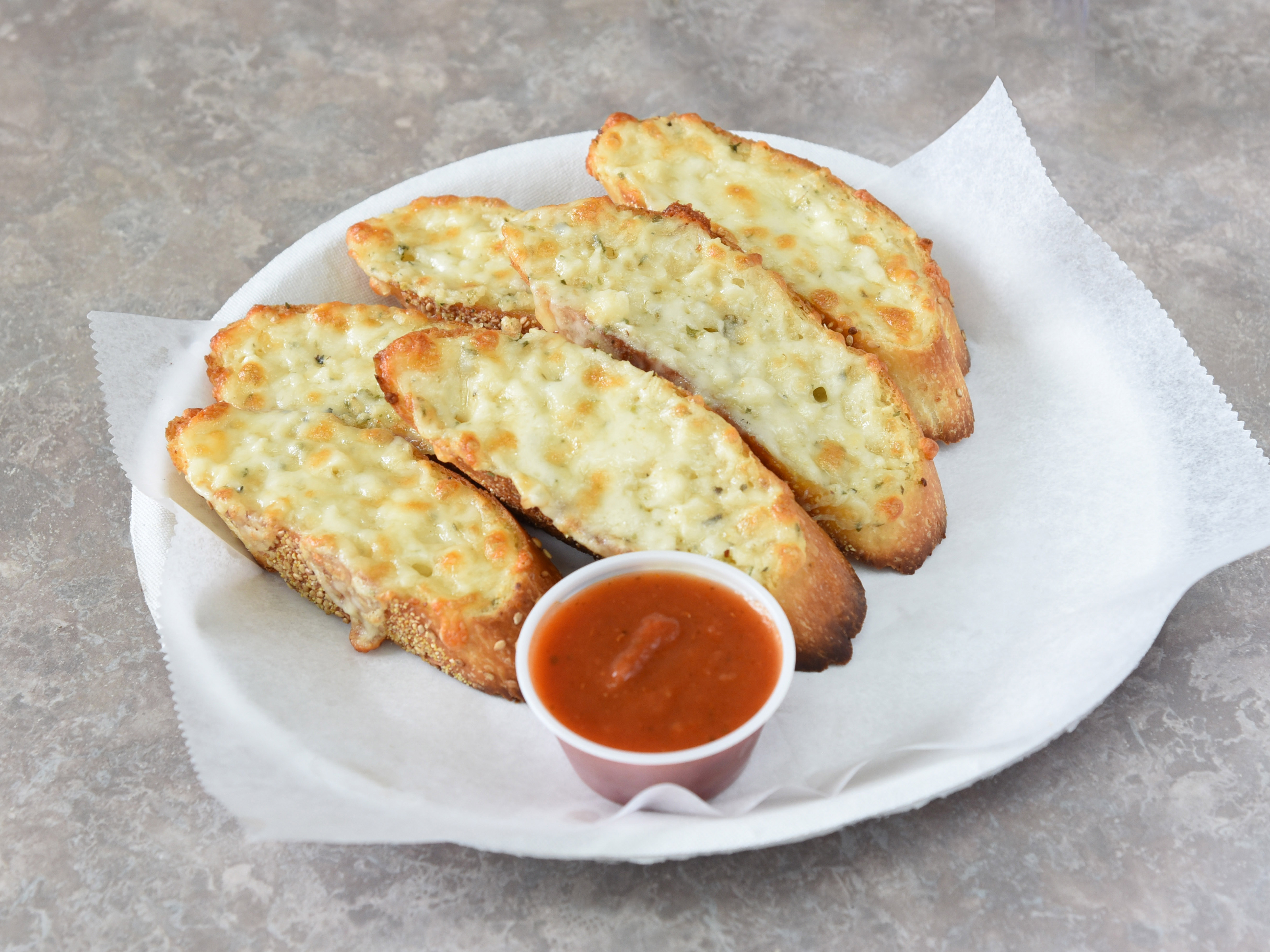 Order Garlic Bread with Cheese food online from Indigo Pizza store, Yonkers on bringmethat.com