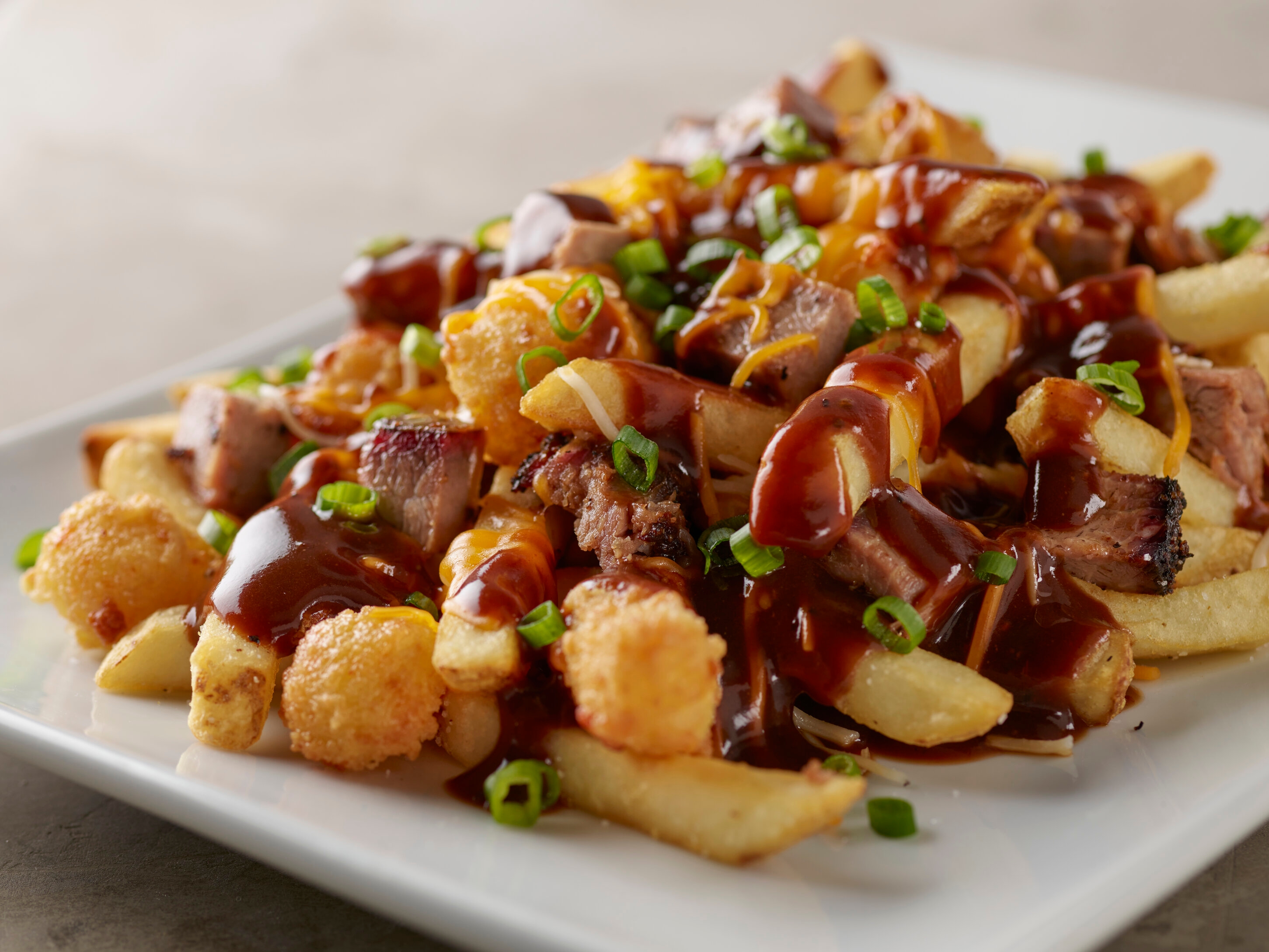 Order Brisket Poutine food online from Smokey Bones Barbeque and Grill store, Reynoldsburg on bringmethat.com