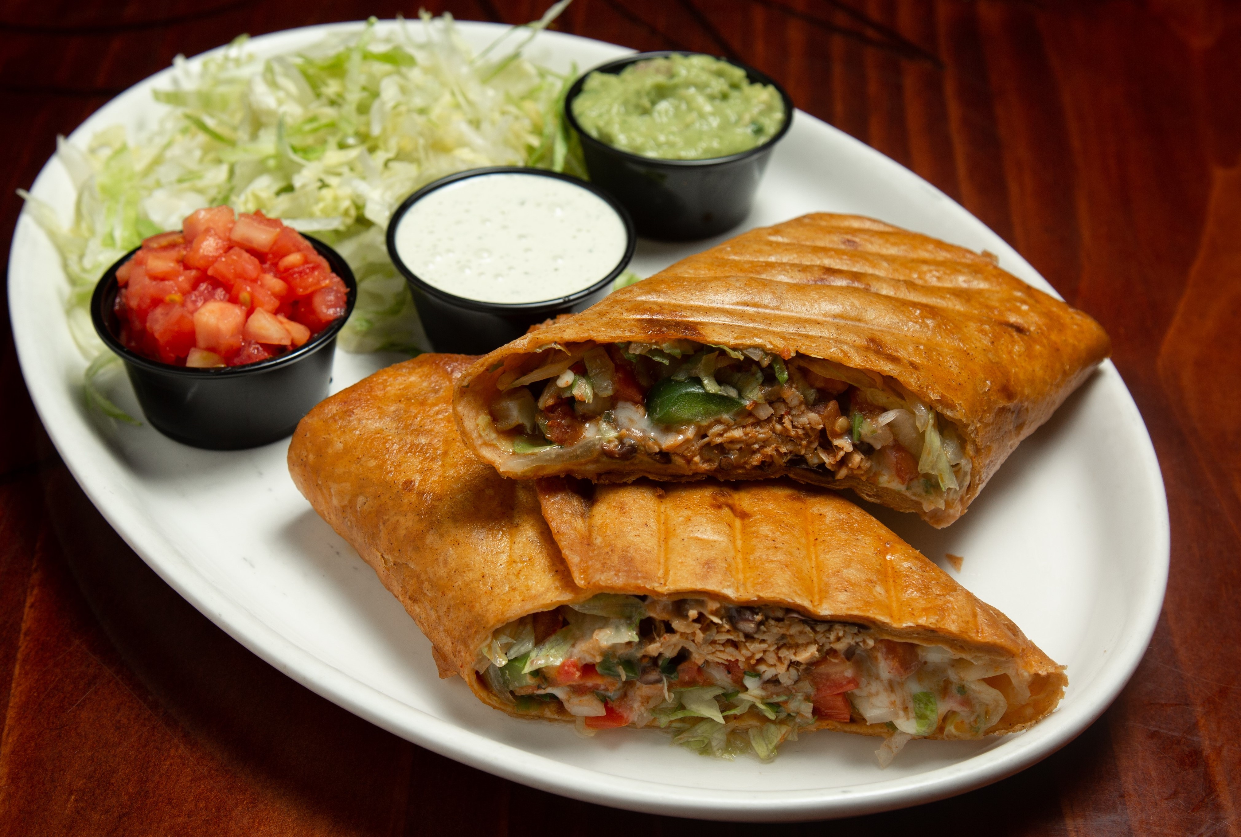 Order Texas Chimichanga Dinner food online from Pueblo Real store, Franklin on bringmethat.com