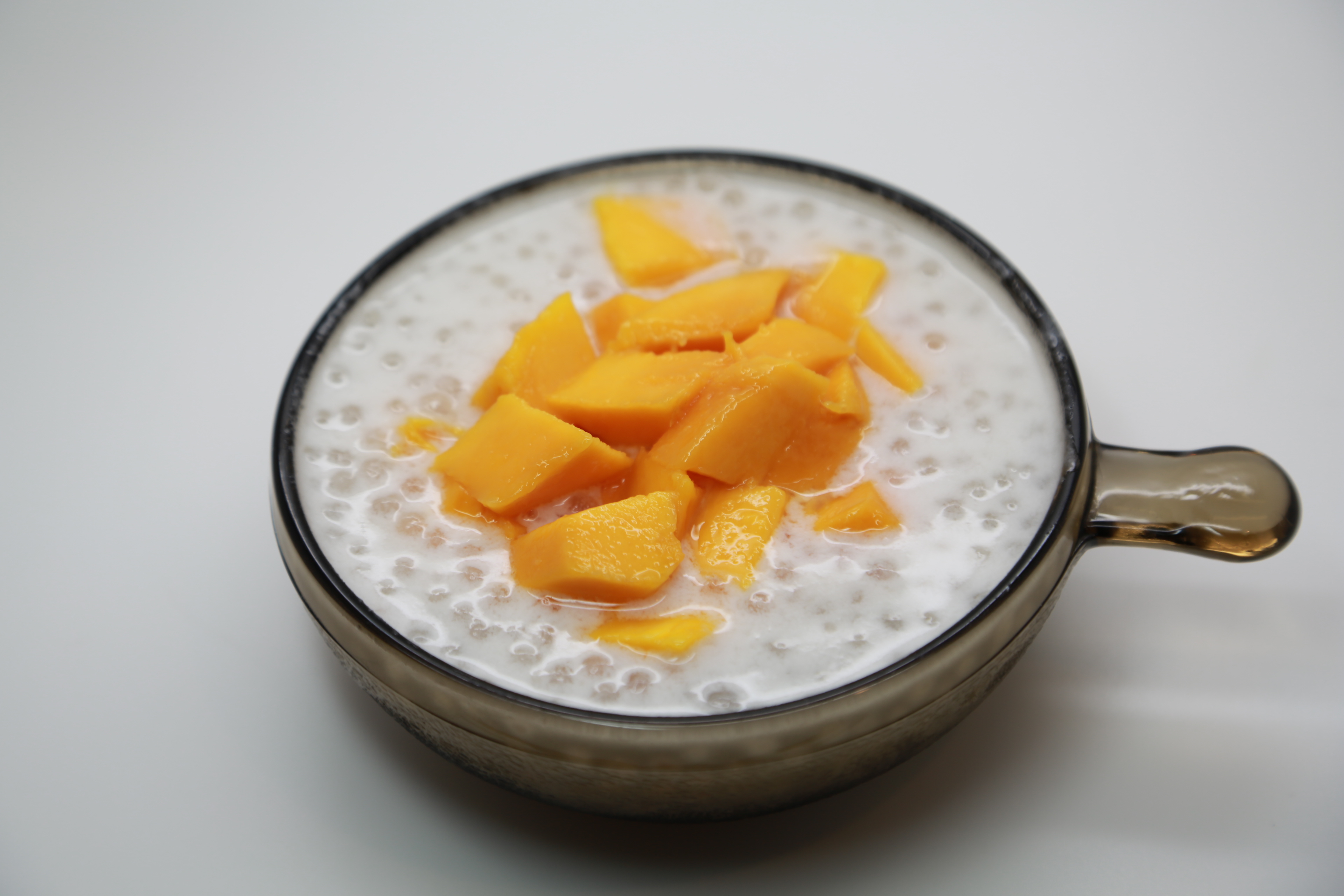 Order T02. Coconut Milk Sago with Mango 芒果椰奶西米露 food online from Uncle Chen Primetime store, State College on bringmethat.com