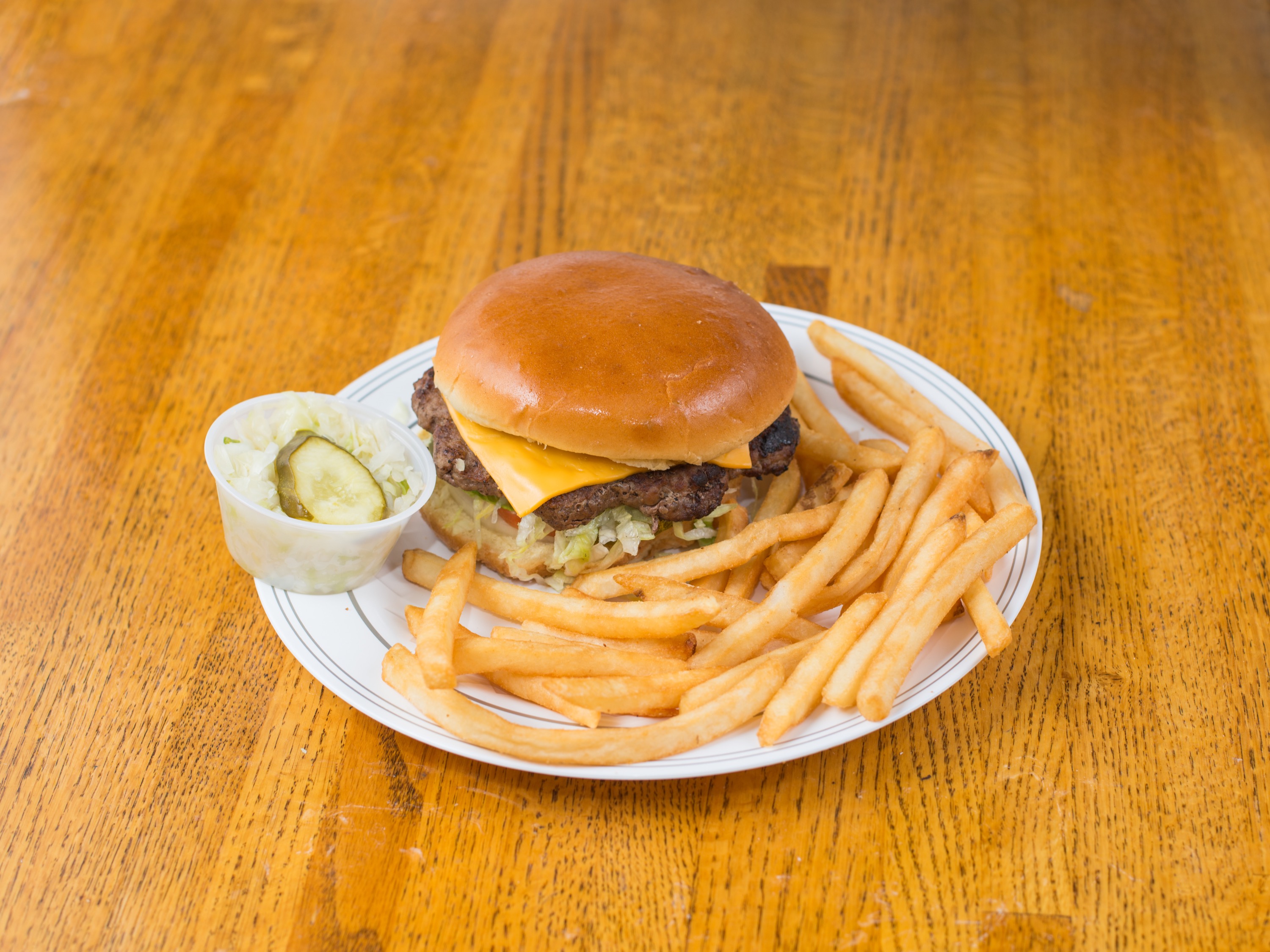 Order Cheeseburger Meal food online from Russell's Barbecue store, Elmwood Park on bringmethat.com