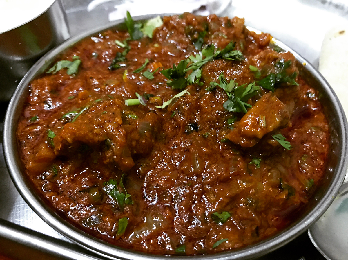 Order mutton kohlapuri food online from House Of Biryani store, Chicago on bringmethat.com