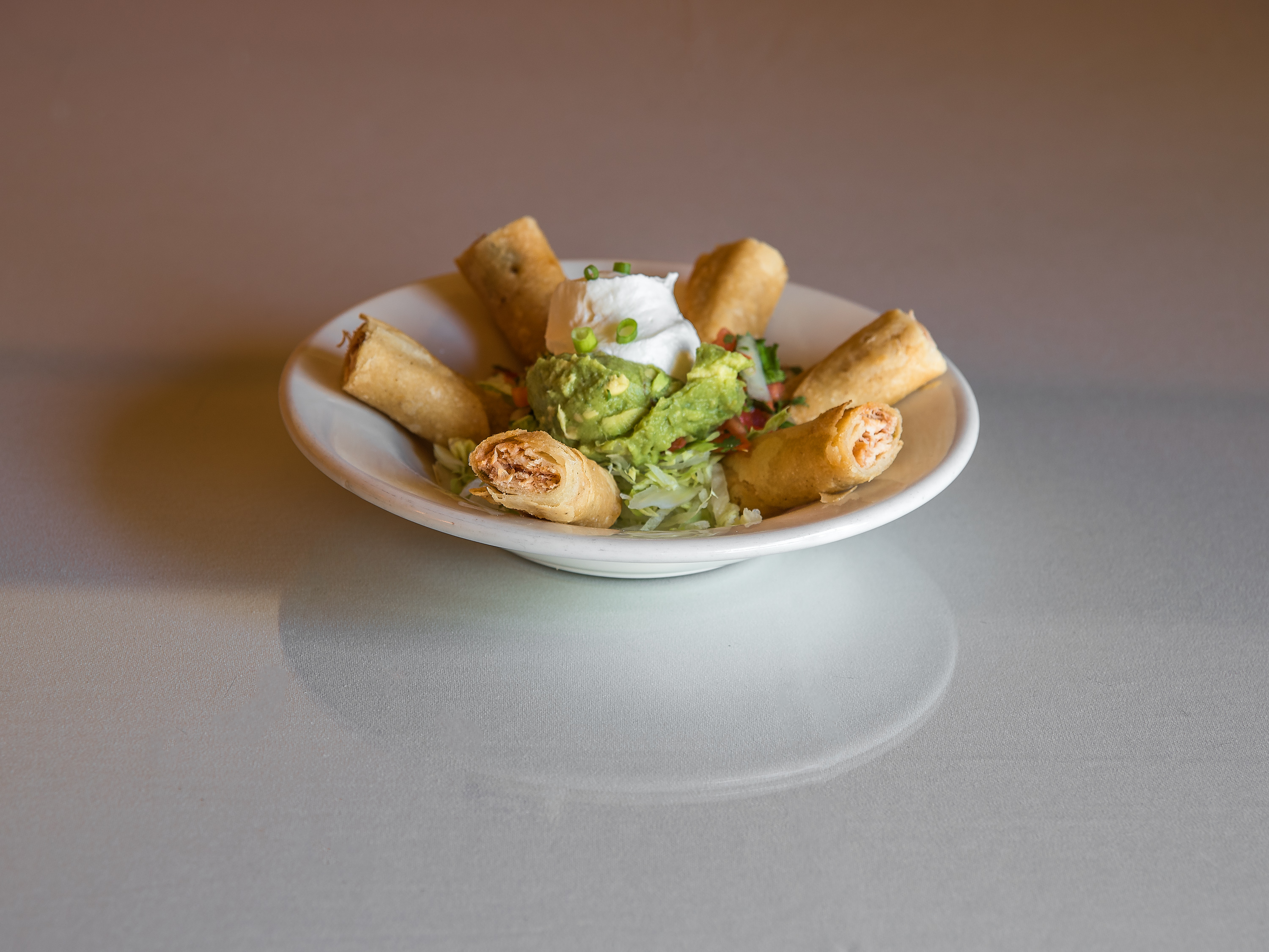 Order Olvera Style Taquitos food online from Pueblo Viejo Grill store, Indio on bringmethat.com