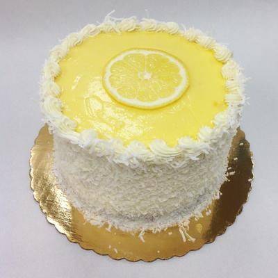 Order New 4" Whole Coconut Lemon Cake food online from Ny Popcorn store, New York on bringmethat.com