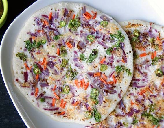 Order Onion and Chilli Uttapam  food online from Dosa Delight store, Jackson Heights on bringmethat.com